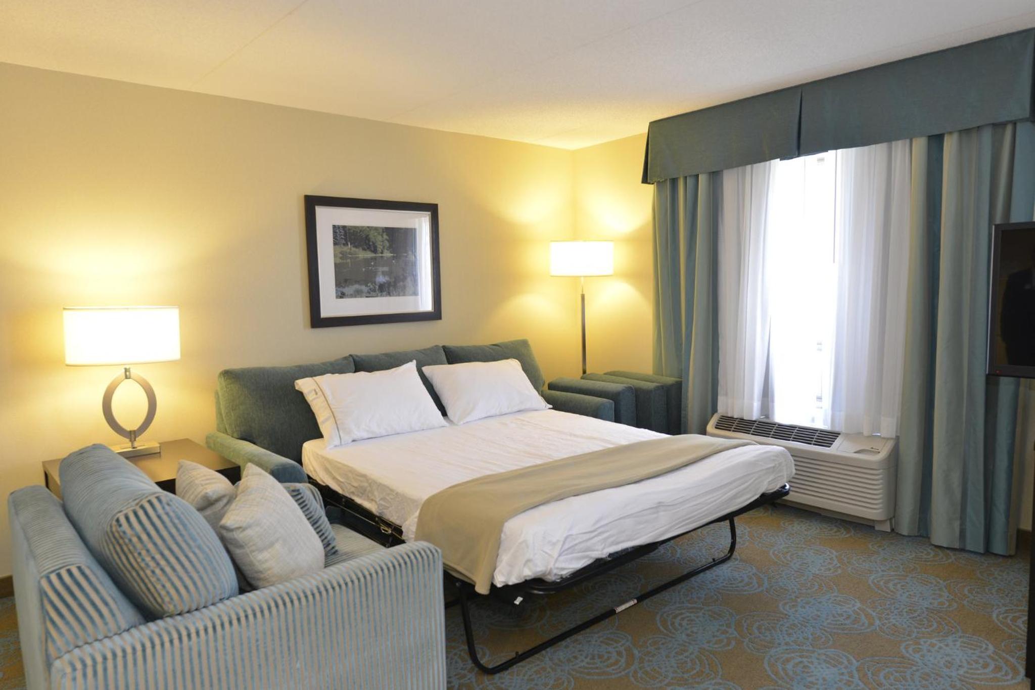 Queen Suite with Two Queen Beds and Sofa Bed with Wet Bar