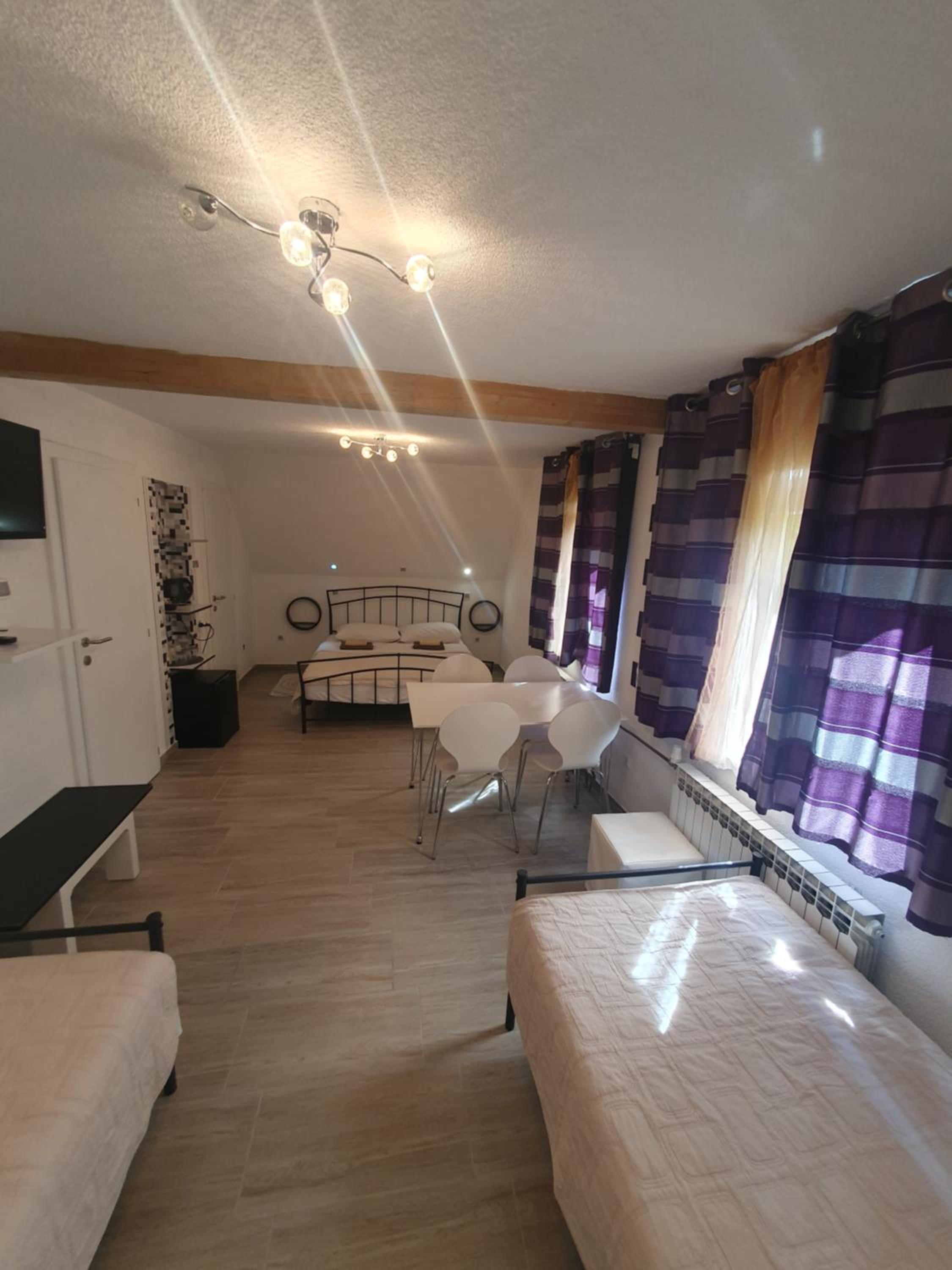 Quadruple Room with Garden View - Photo 10