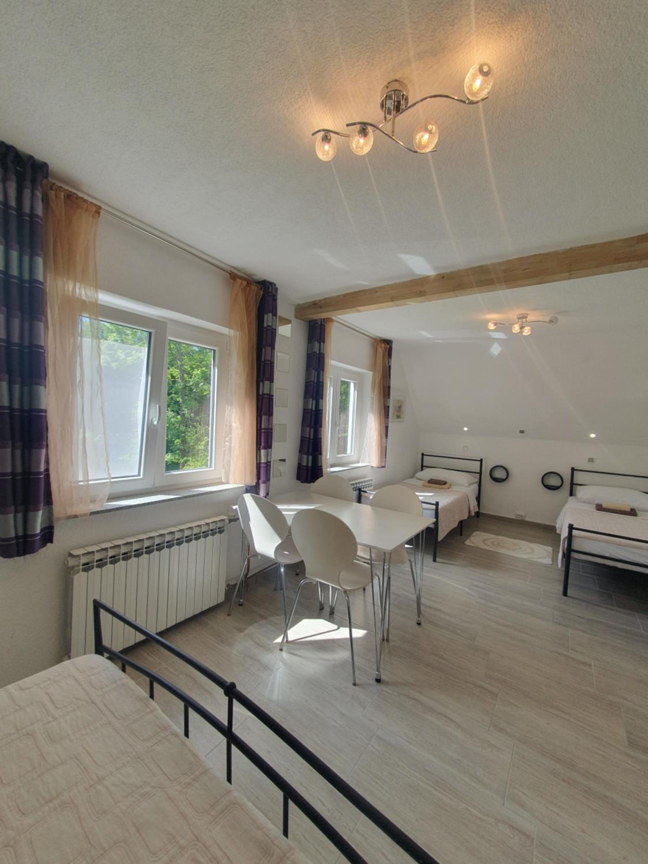 Quadruple Room with Garden View - Photo 11