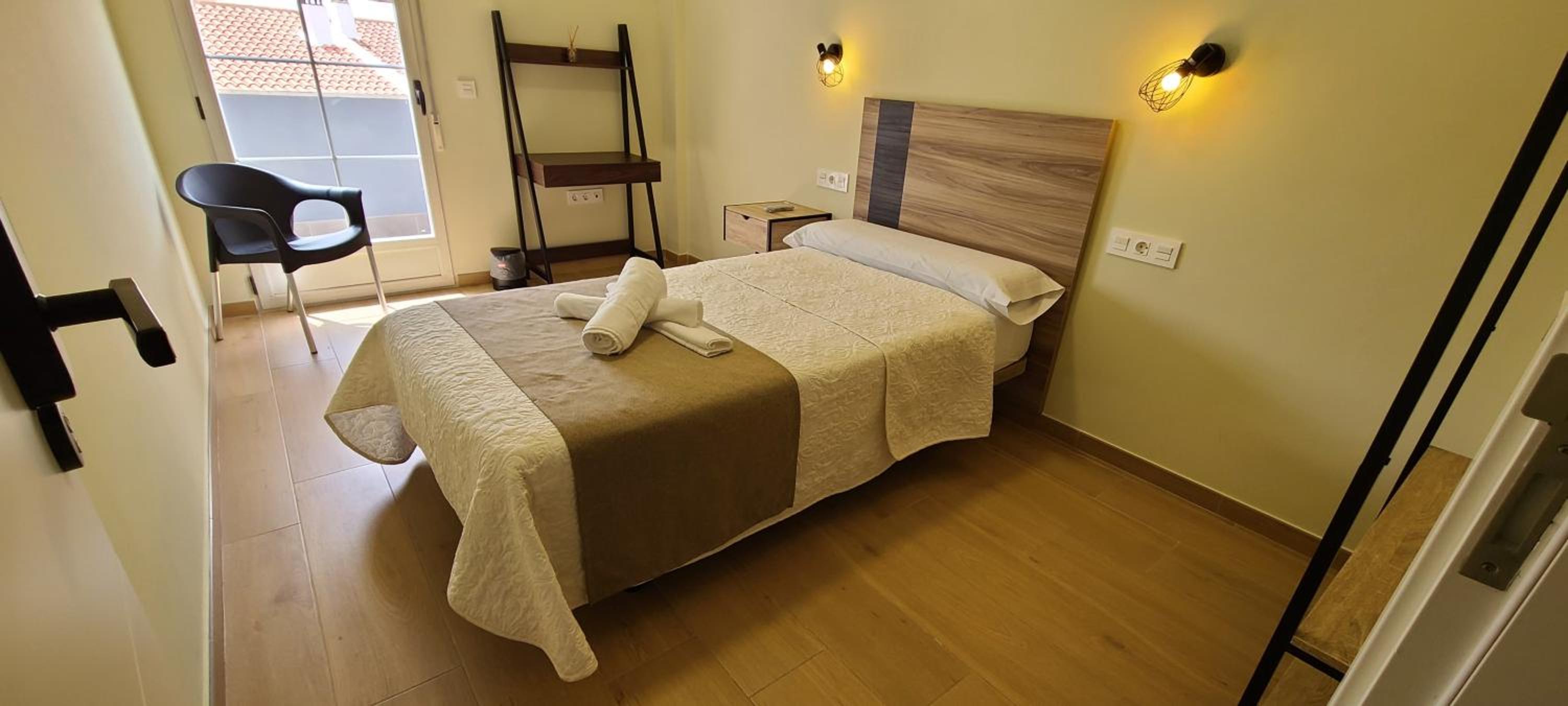 Habitación individual con baño compartido