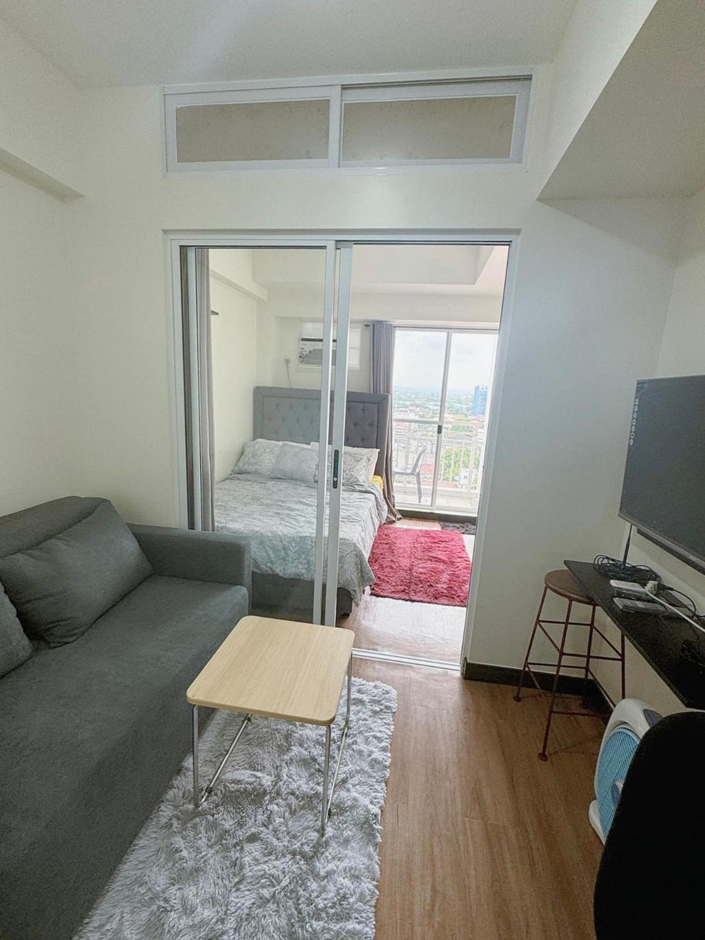 One-Bedroom Apartment with Balcony and City View
