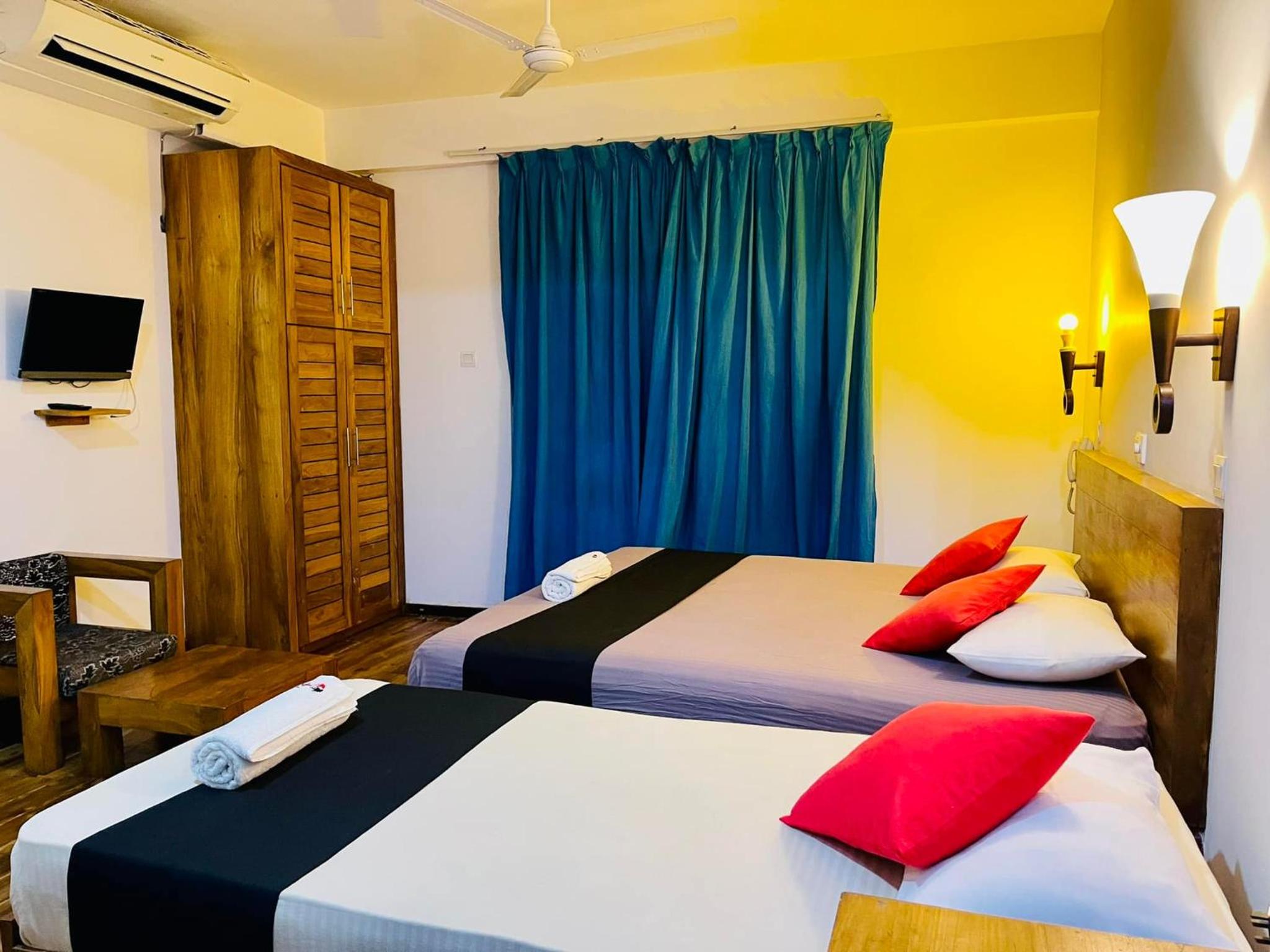 Deluxe City View Triple Room