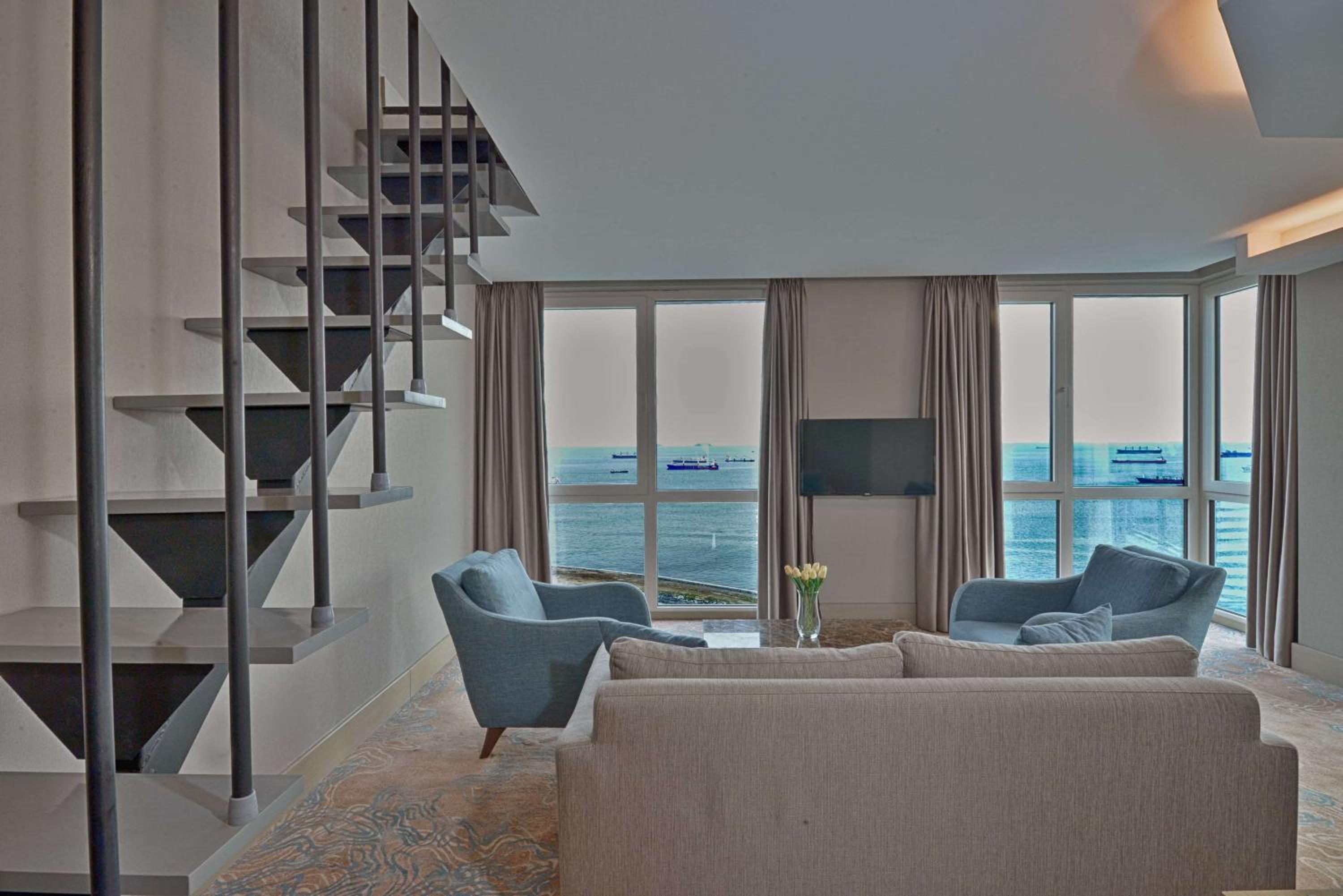 Duplex Suite with One Queen Bed and Two Single Beds with Balcony and View thumbnail 5