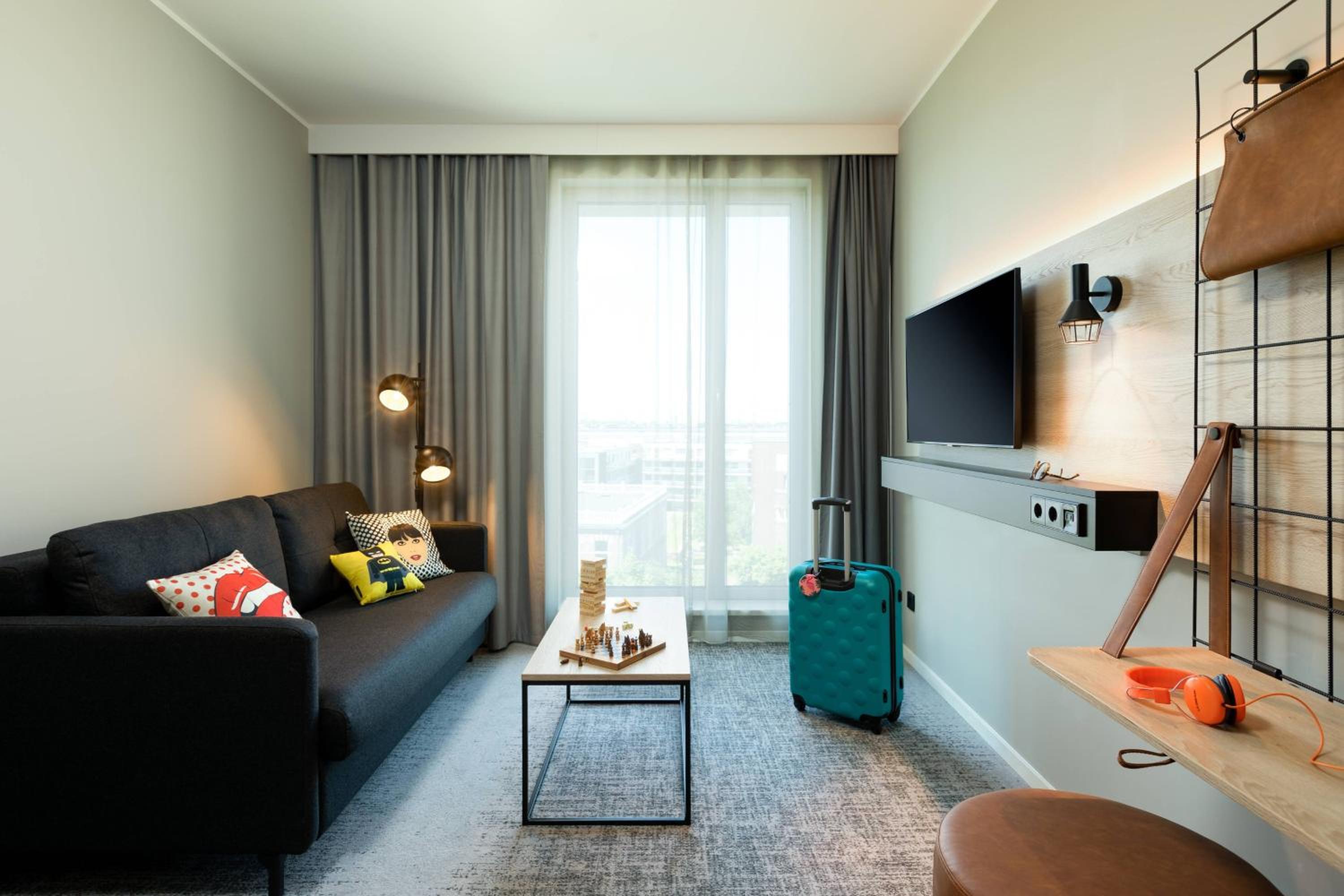 Moxy Extra Sleeper XL Queen Room with Sofa Bed - Photo 3