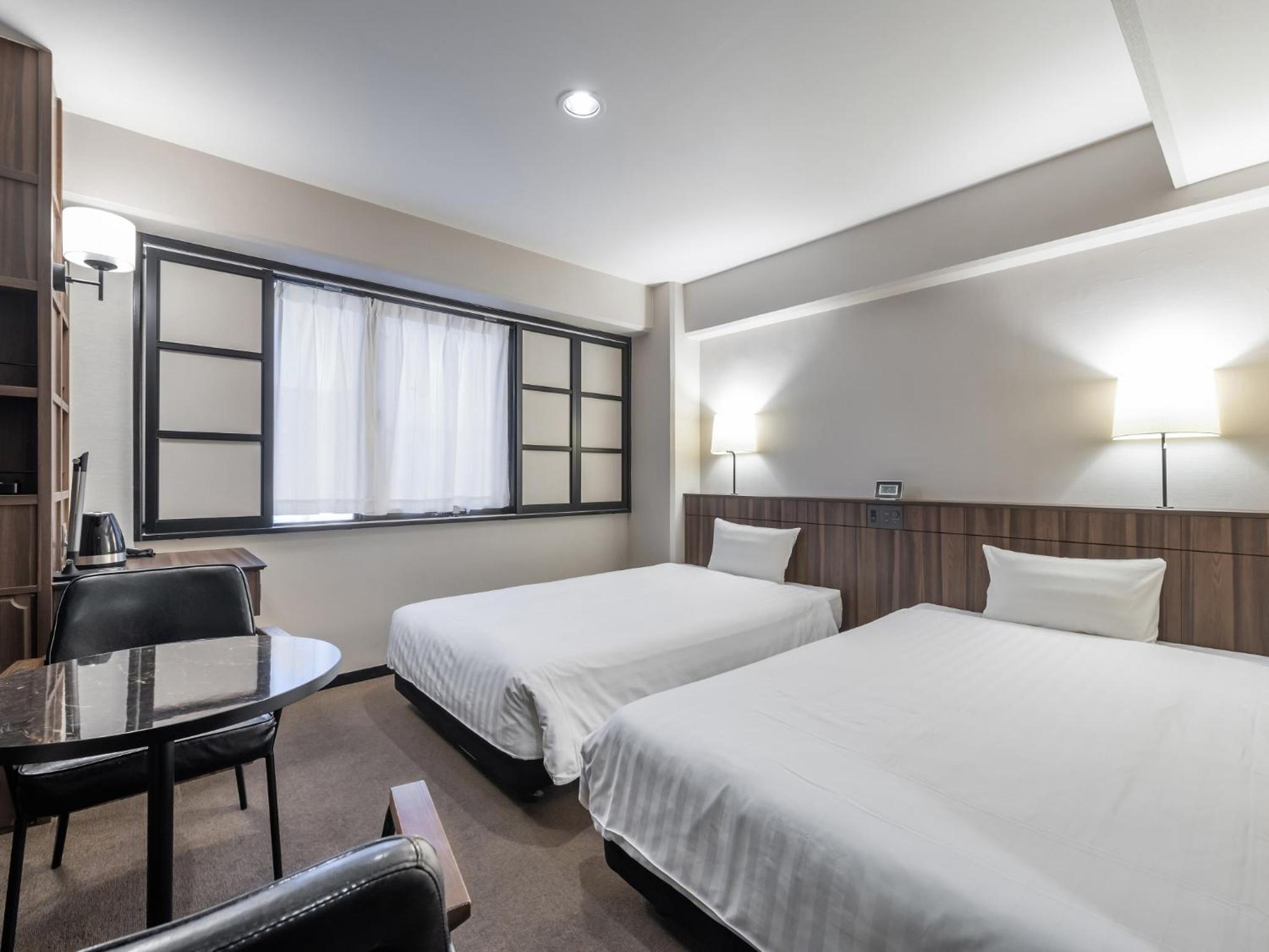 Twin Room - Non-Smoking - Photo 1