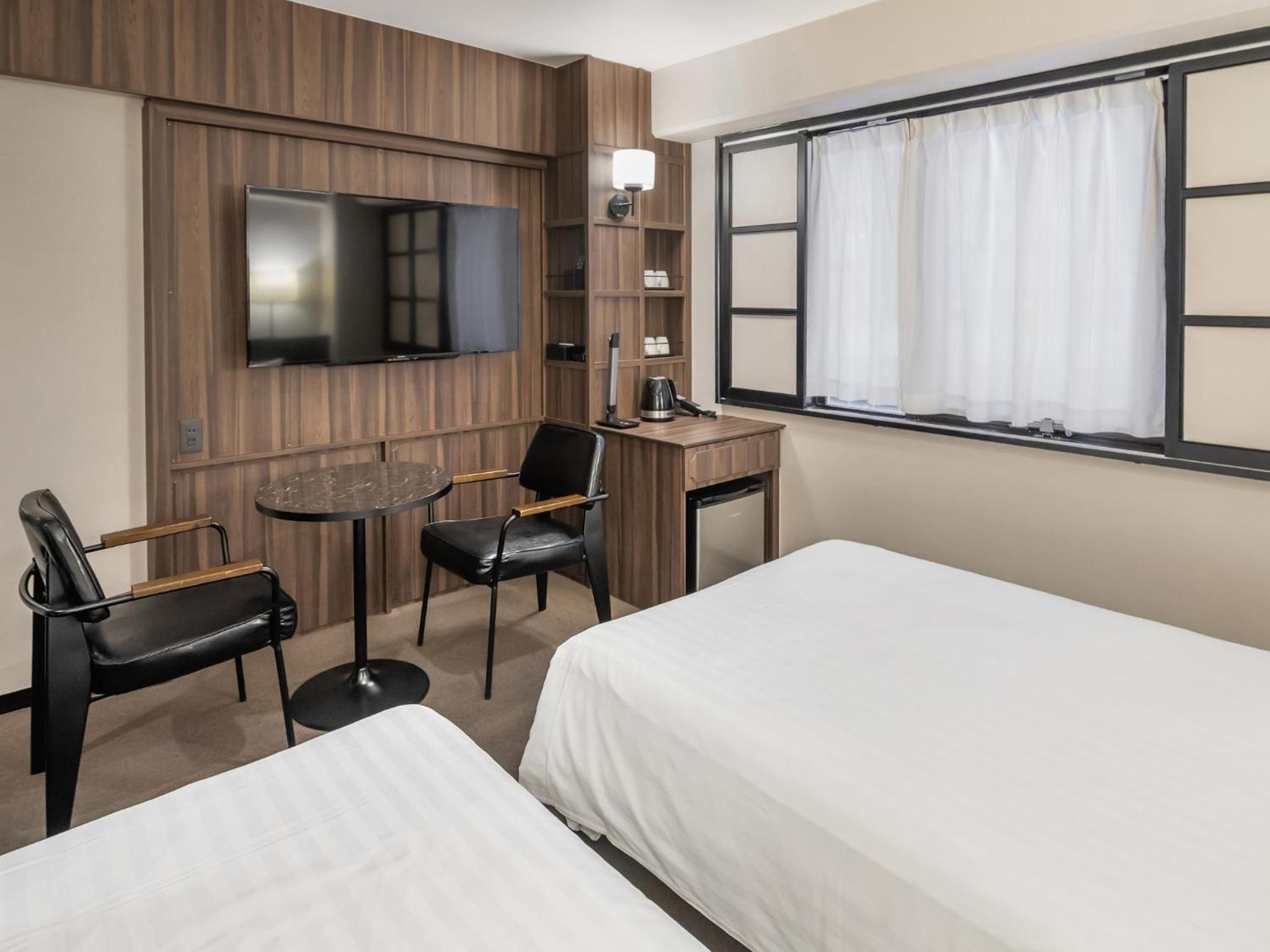 Twin Room - Non-Smoking - Photo 4