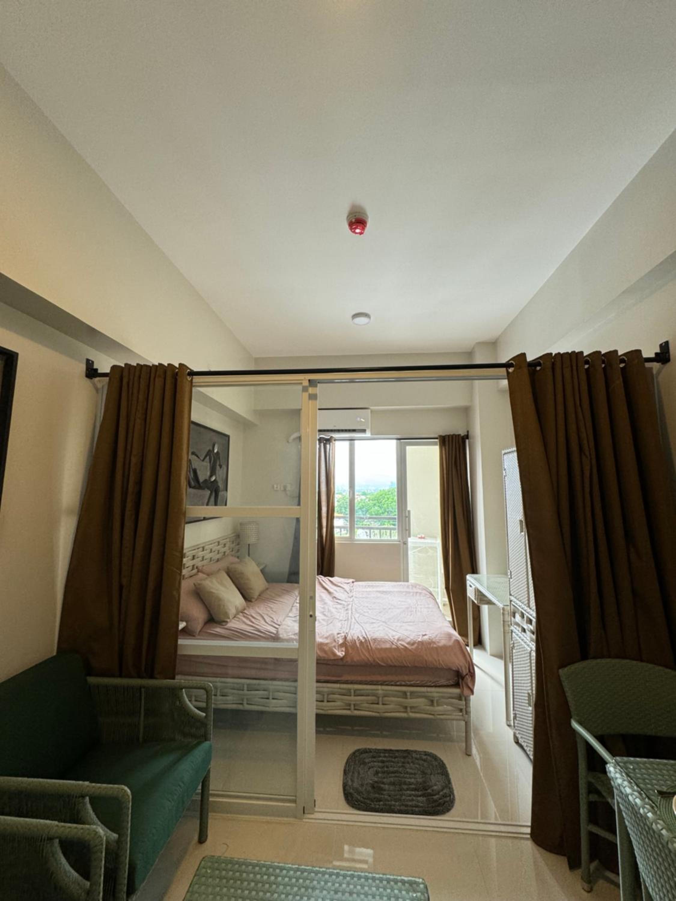 One-Bedroom Apartment with Balcony and City View