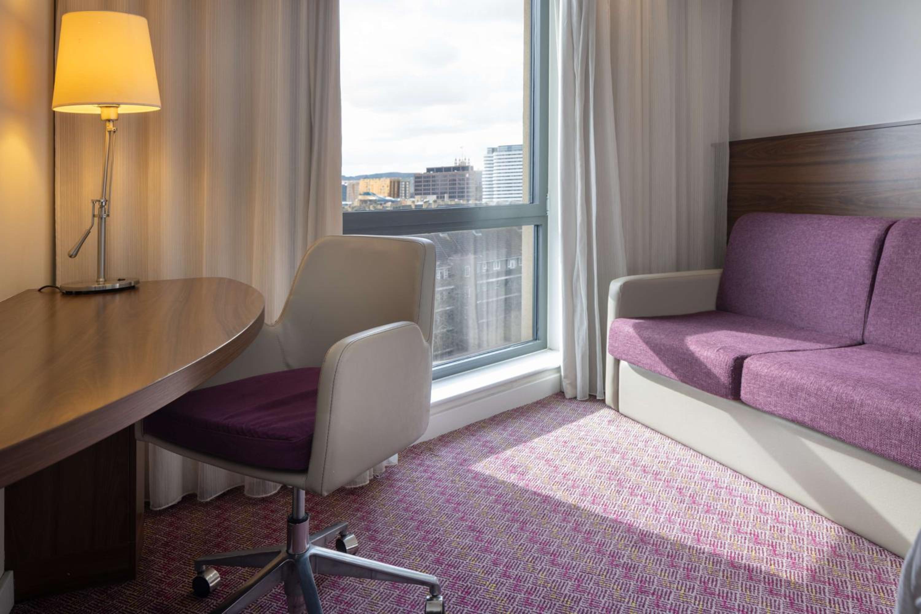Queen Room with Sofa Bed and City View photo 3