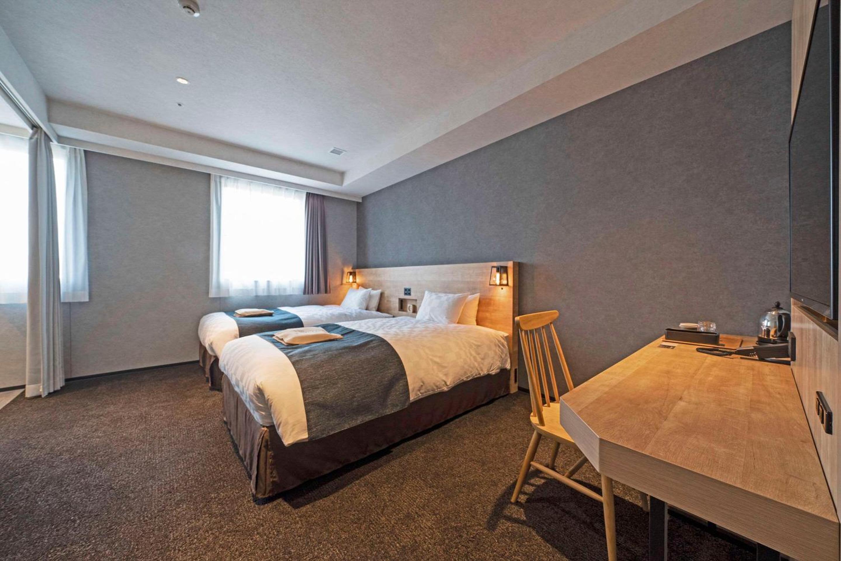 Universal Twin Room-Non Smoking - Photo 1