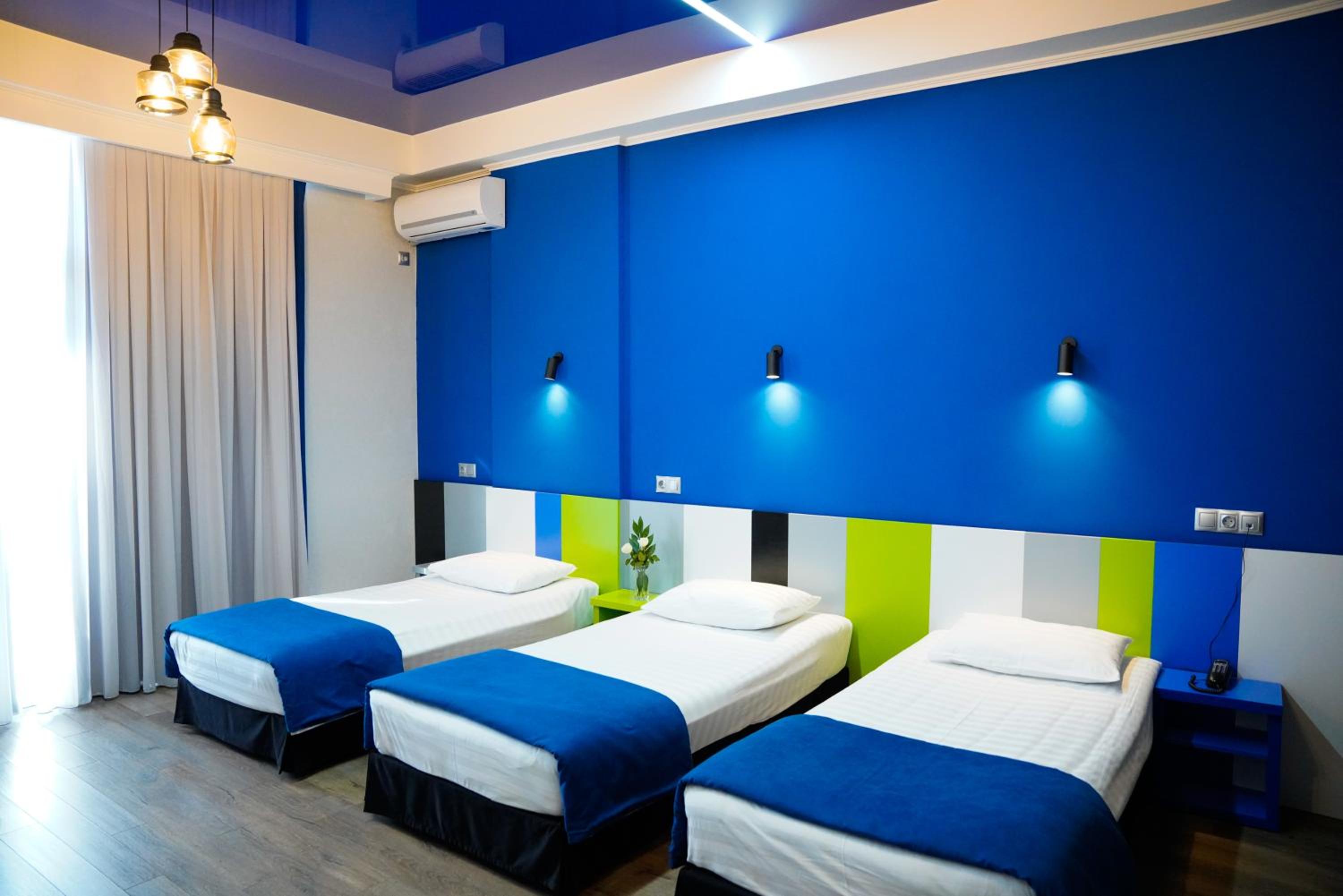 Triple Room with Balcony - Photo 1