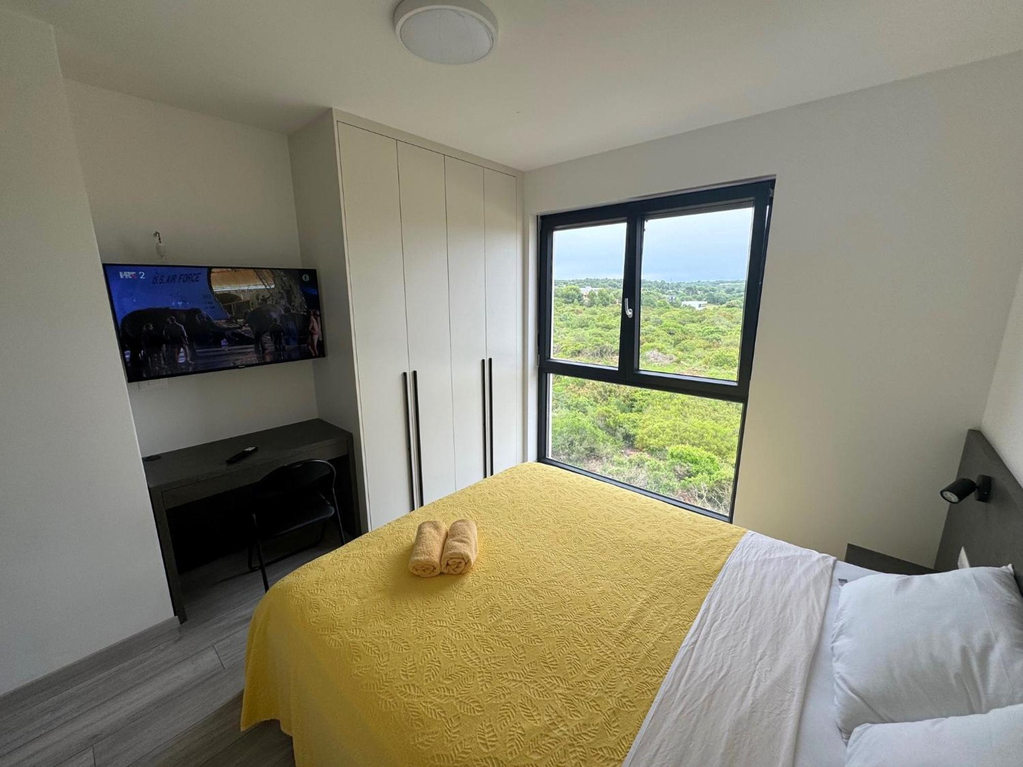 Three-Bedroom Apartment with Sea View