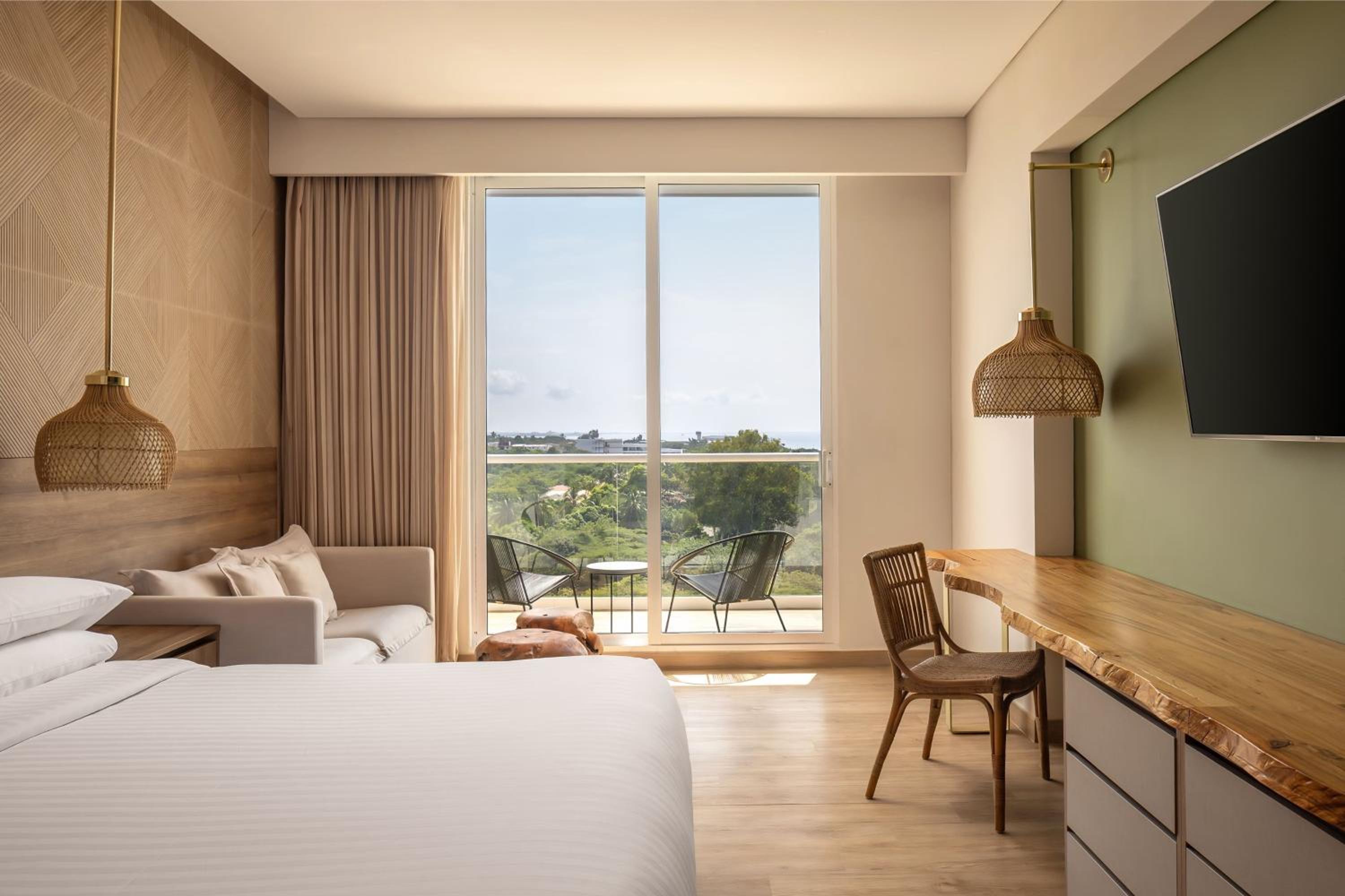 Habitación de huéspedes, 1 cama King, sofá cama, vista parcial al mar, balcón photo 2