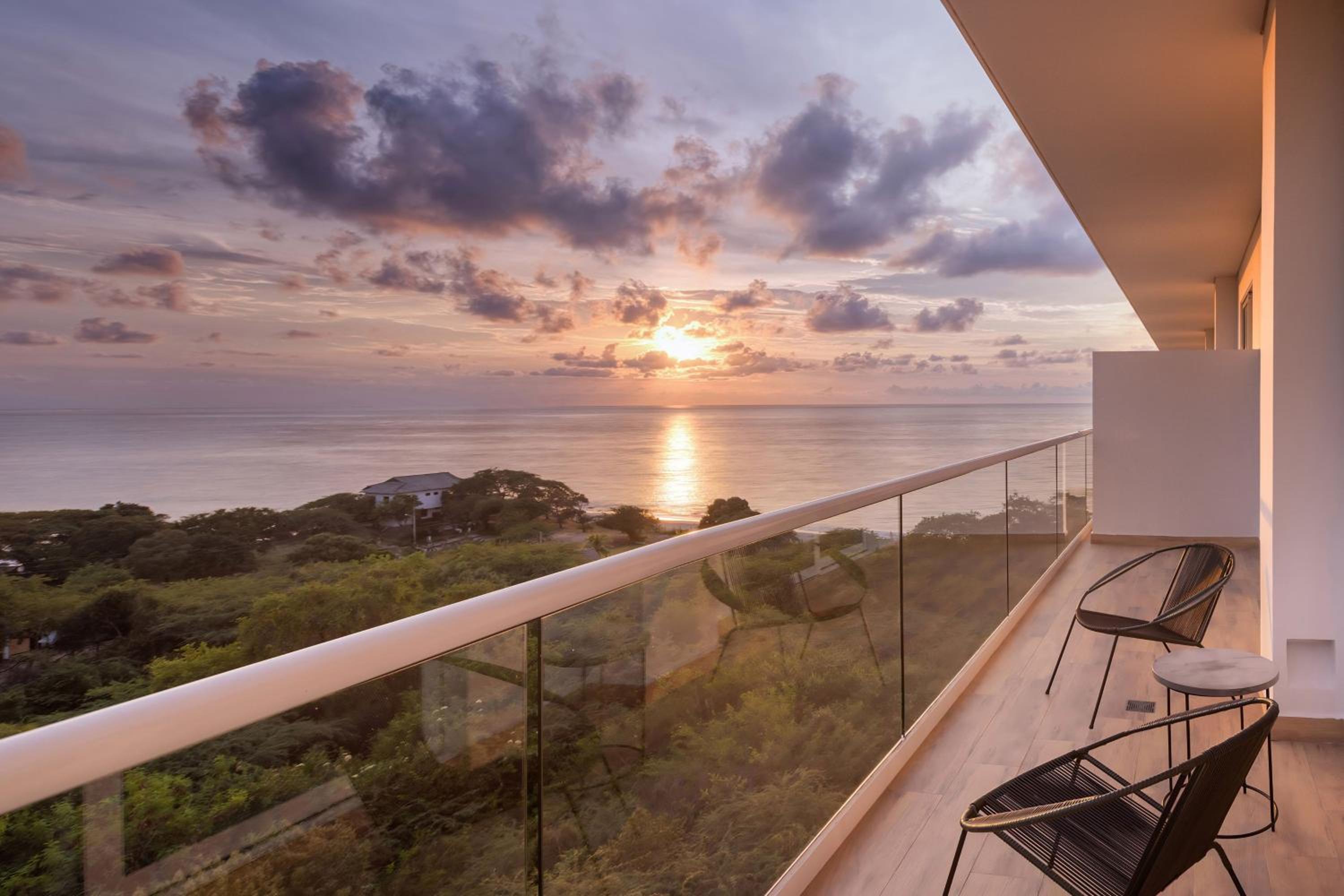 Junior King Suite with Sofa Bed and Partial Ocean View photo 1