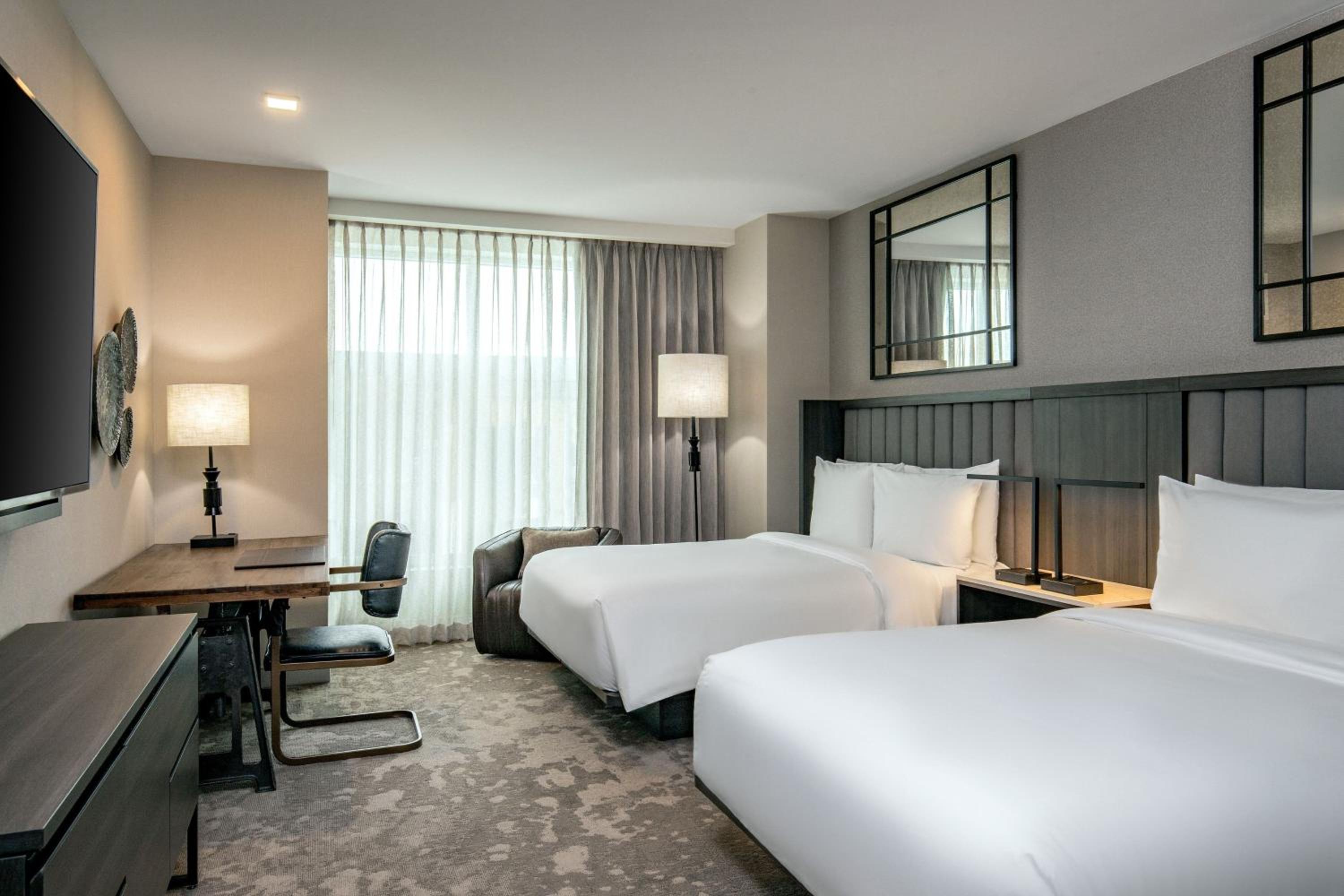 Queen Room with Two Queen Beds - Photo 1