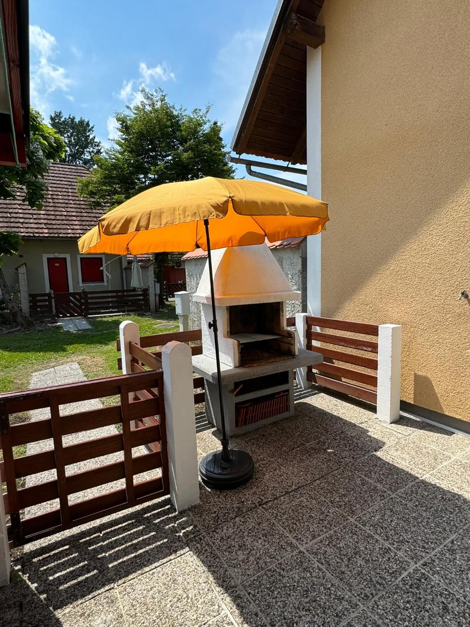 Three-Bedroom House - Photo 16