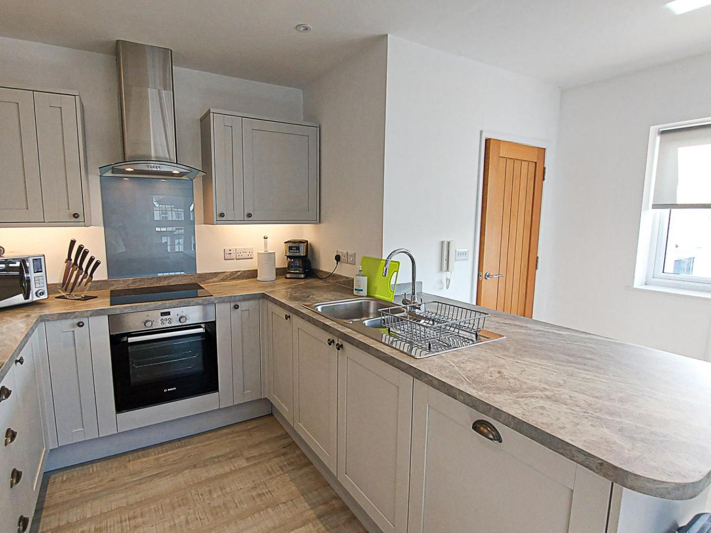 Three-Bedroom Apartment with Balcony and Terrace photo 3