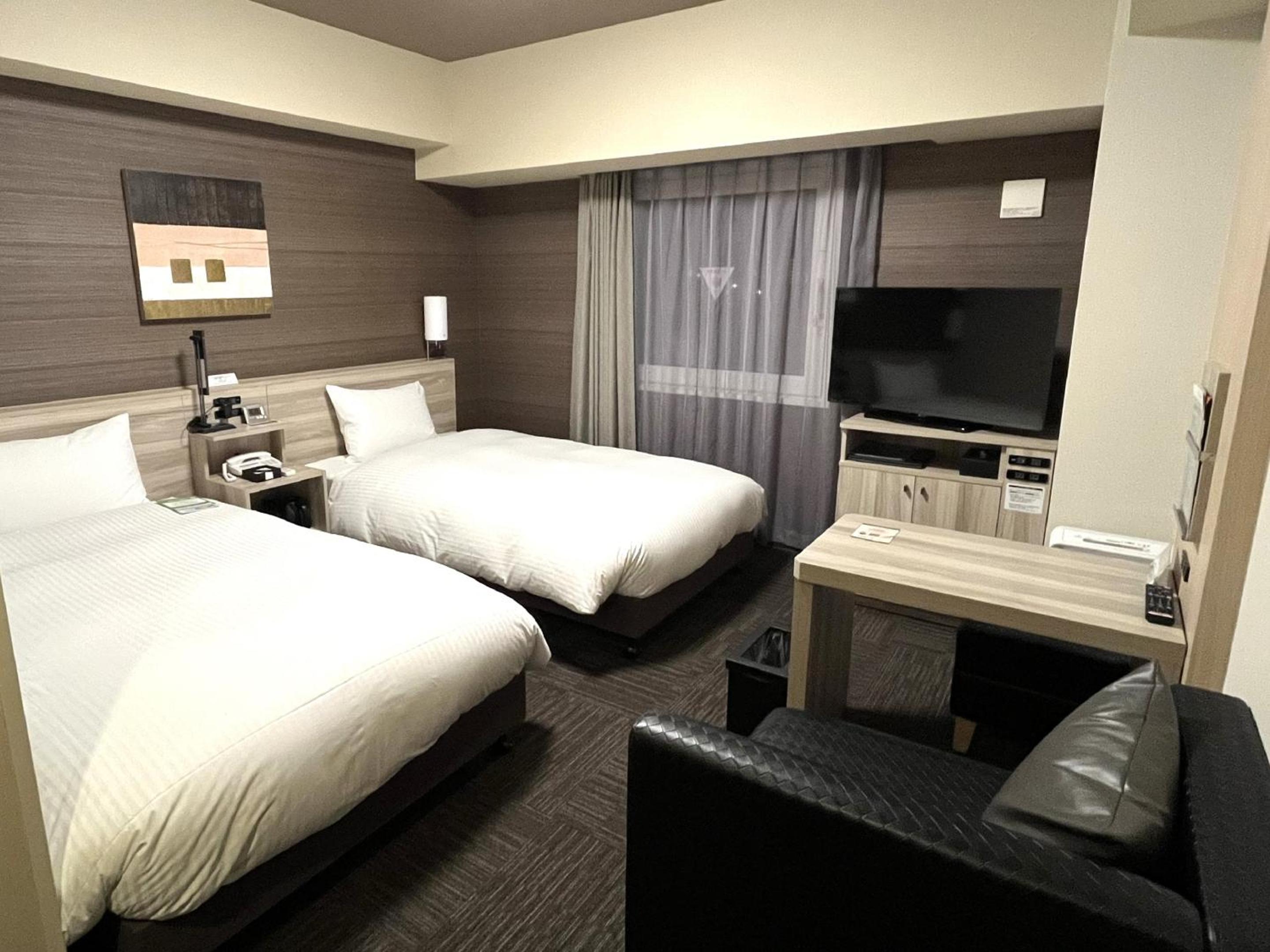 Twin Room - Non-Smoking - Photo 1
