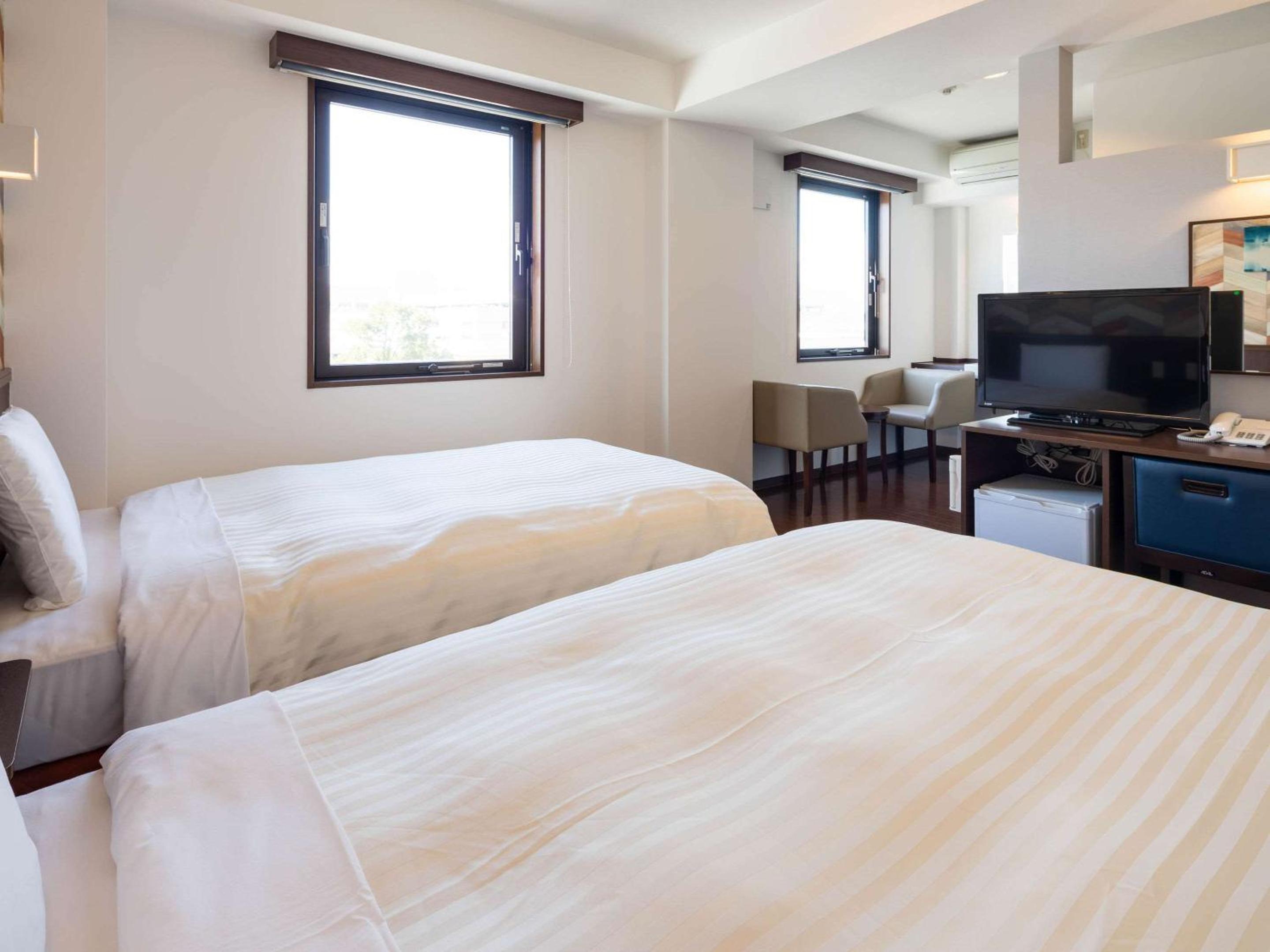 Twin Room - Non Smoking photo 1
