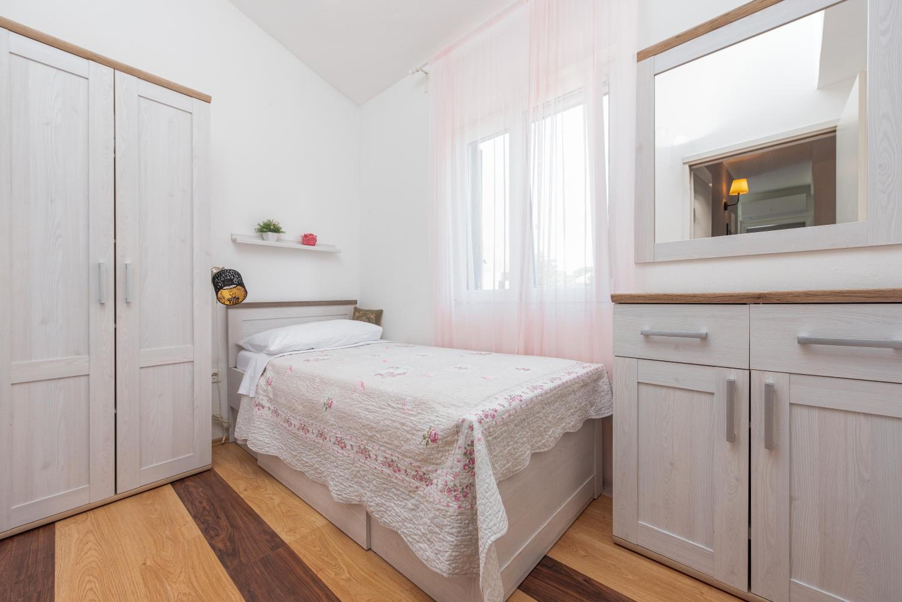 Three-Bedroom Apartment - Photo 24