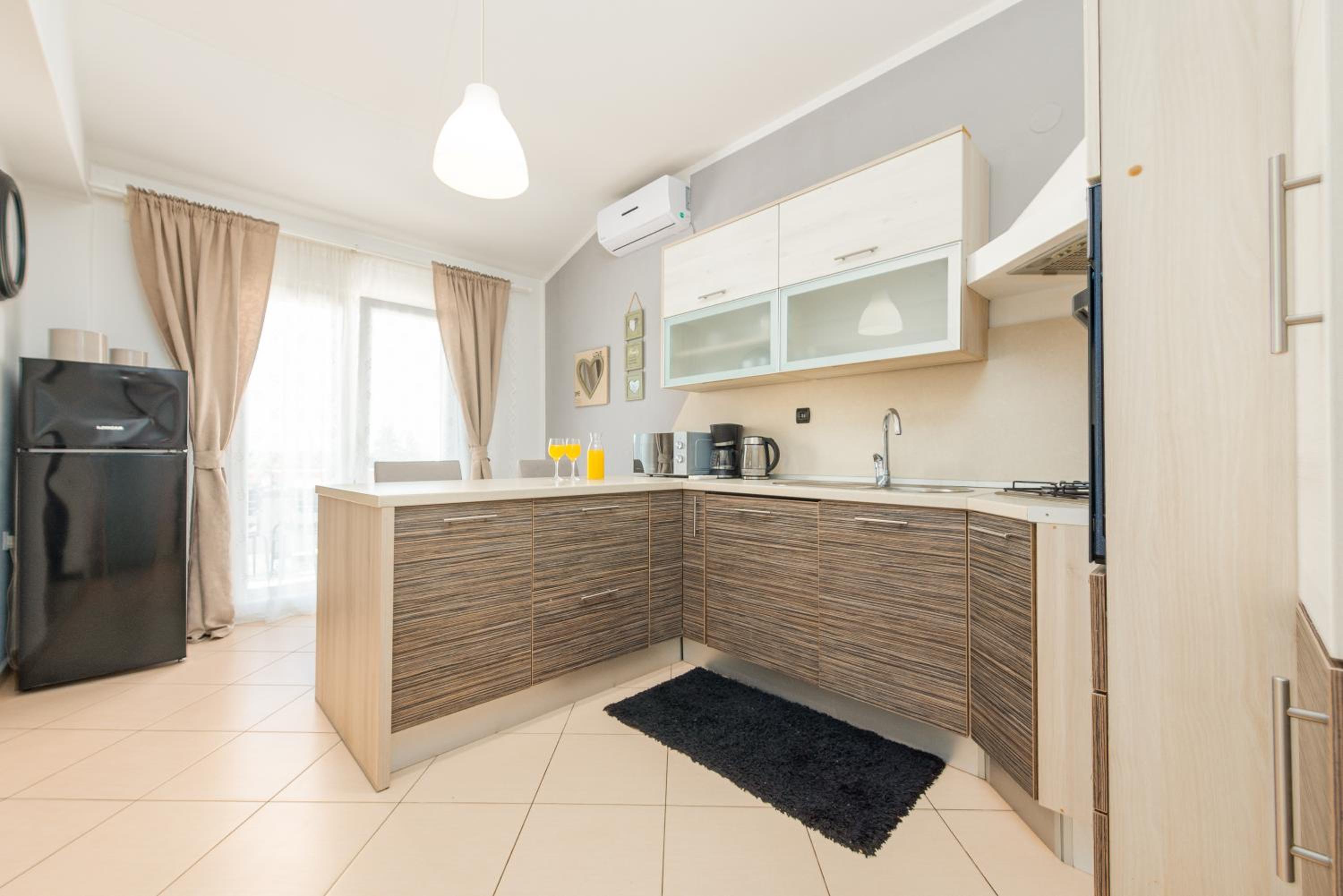 Three-Bedroom Apartment - Photo 30