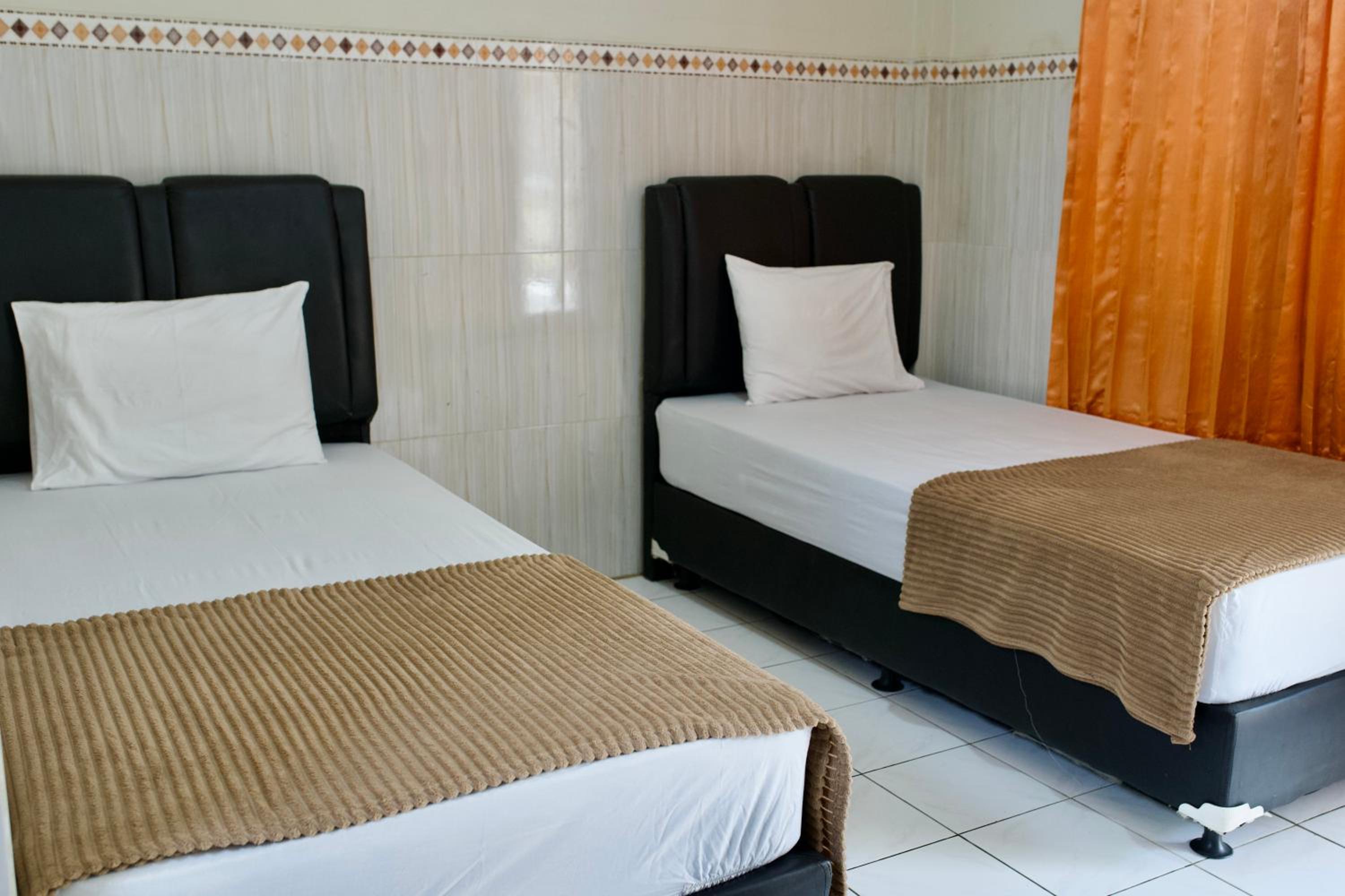 Twin Room - Photo 1