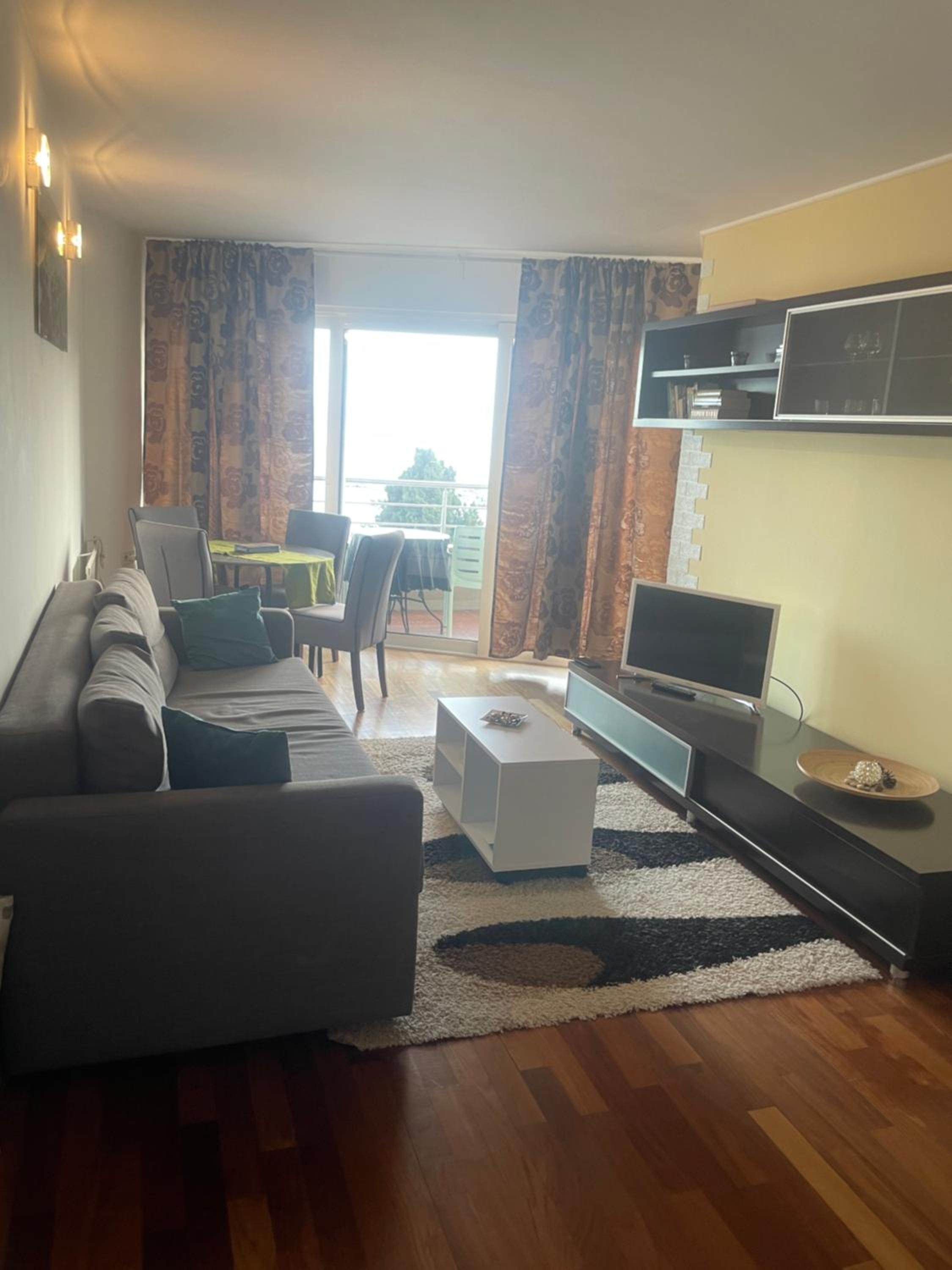 One-Bedroom Apartment with Balcony and Sea View