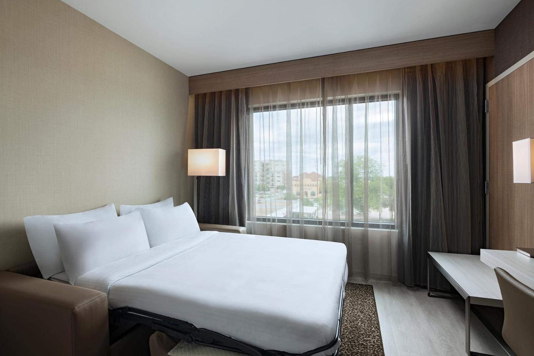 Deluxe King Room with Sofa Bed and City View