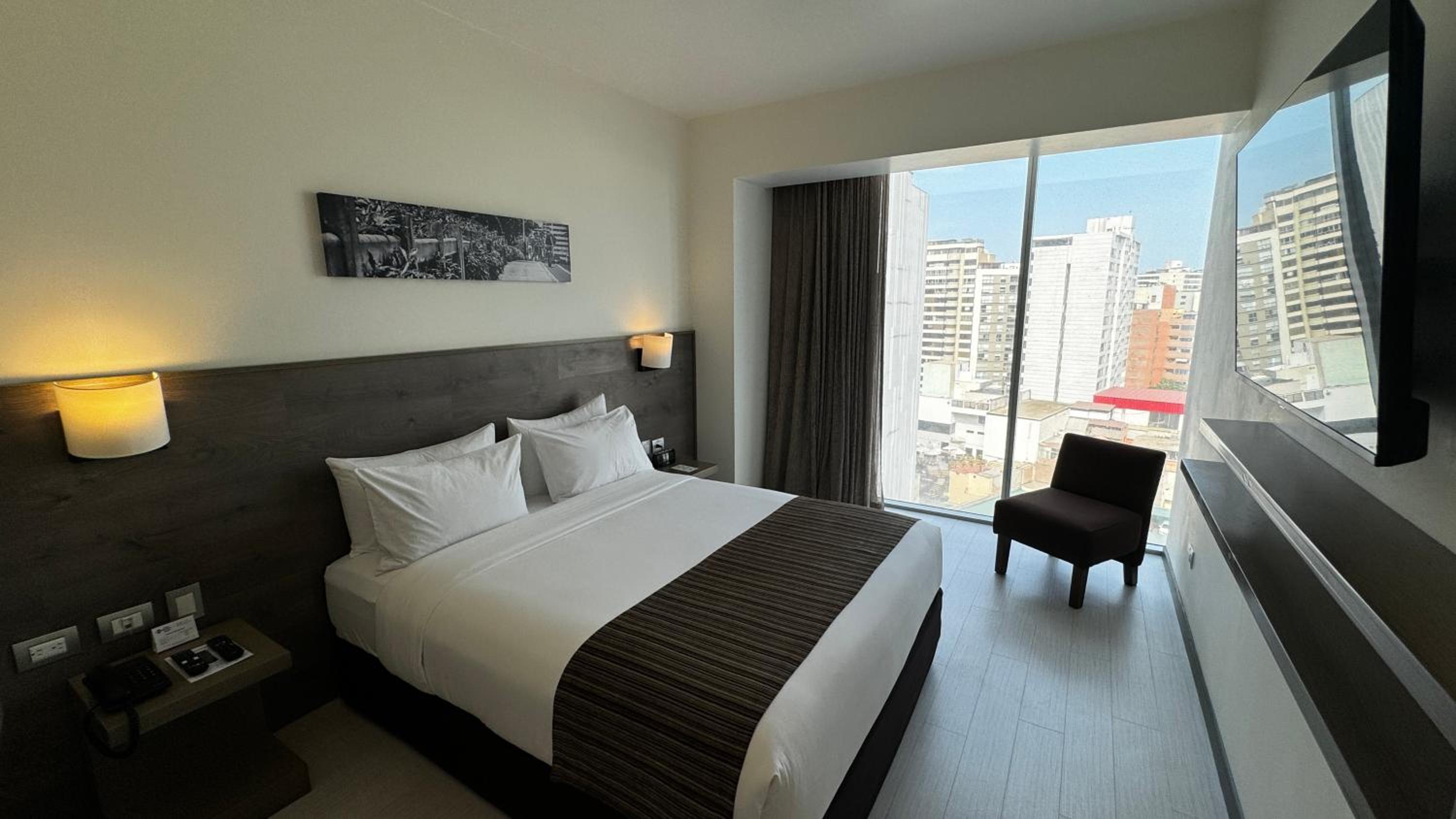Junior Queen Suite with Partial Ocean View photo 1