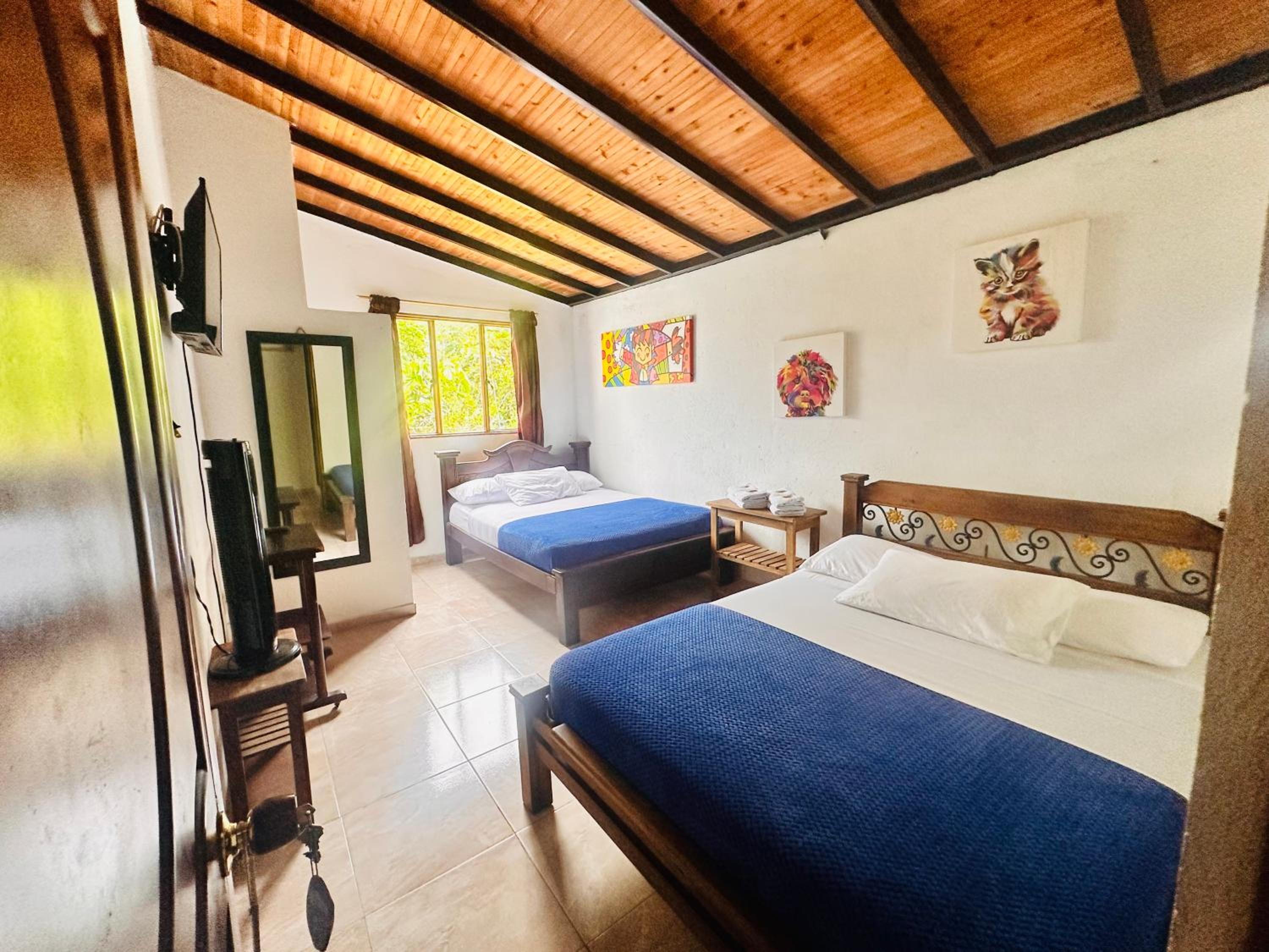 Standard Queen Room with Two Queen Beds photo 1