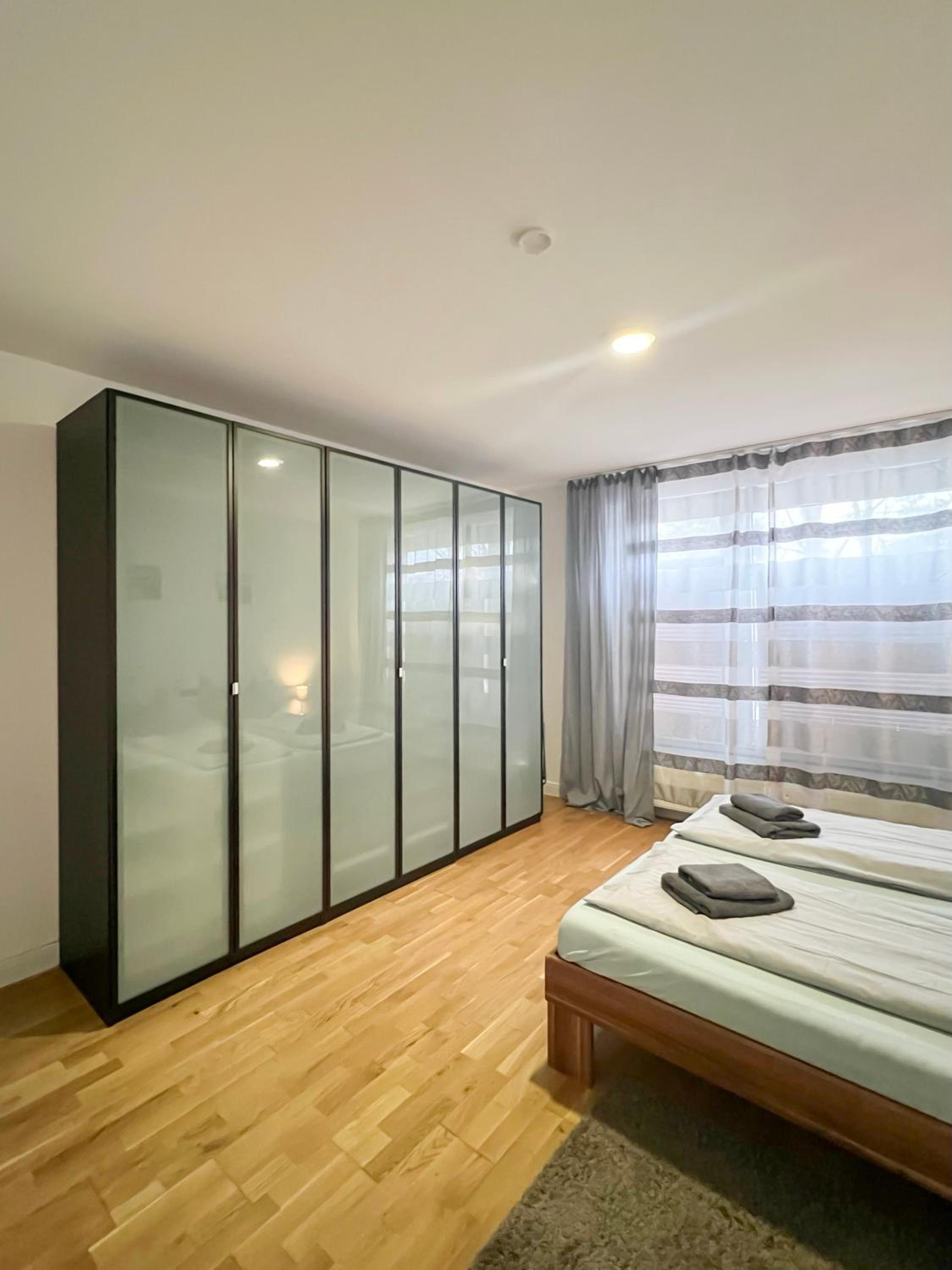 Three-Bedroom Apartment - Photo 14