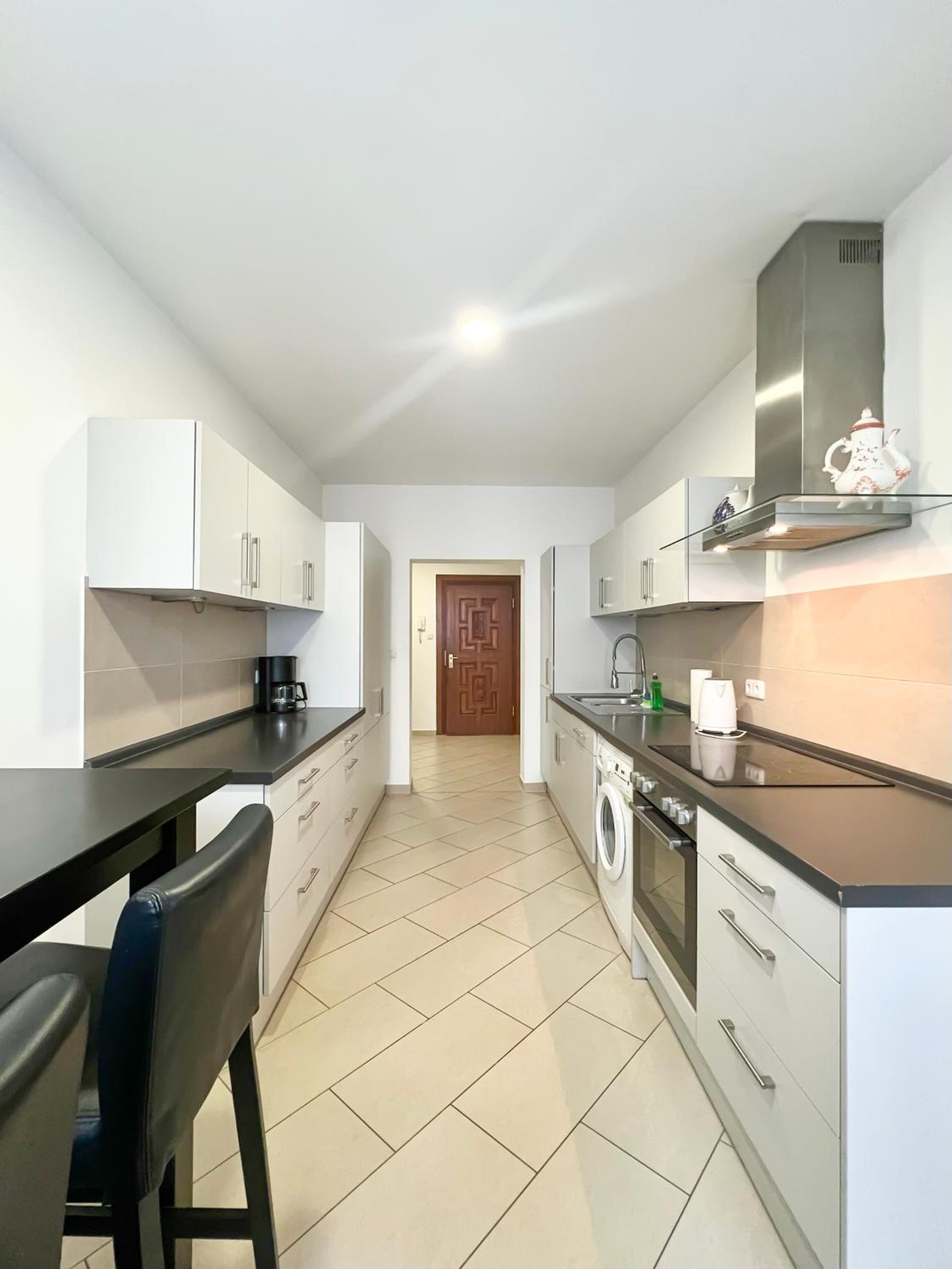 Three-Bedroom Apartment - Photo 13
