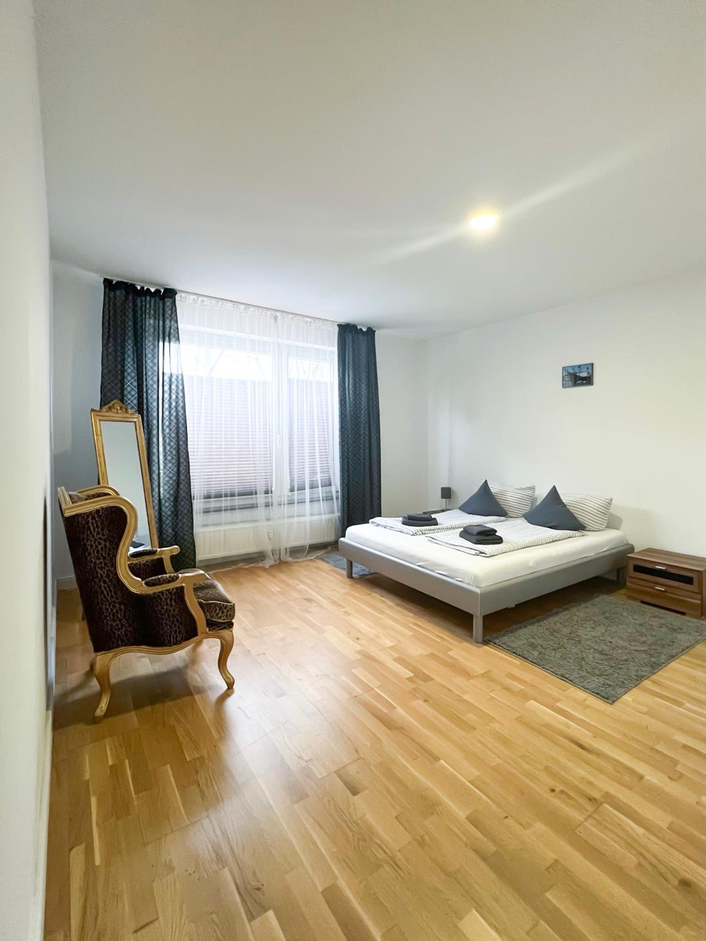Three-Bedroom Apartment - Photo 17