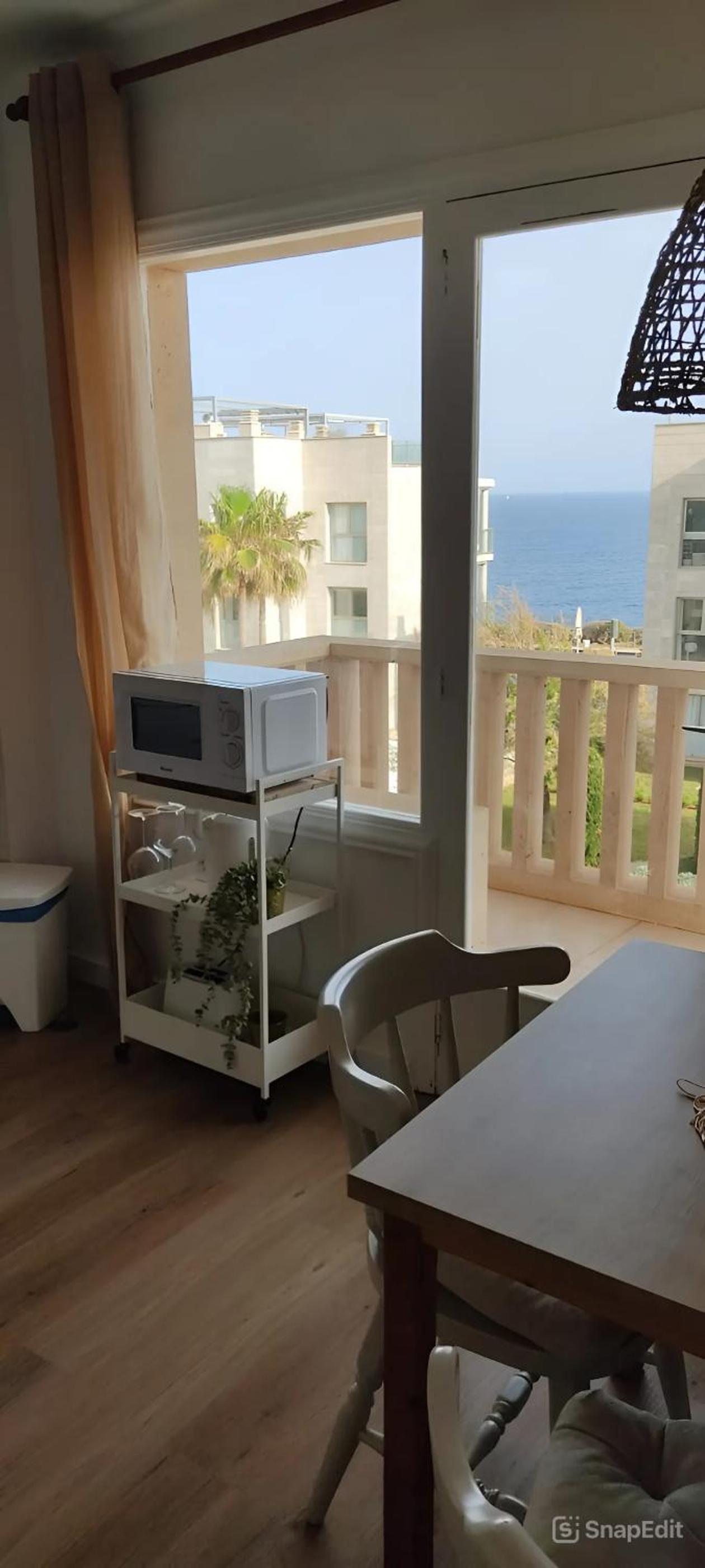 One-Bedroom Apartment with Sea View