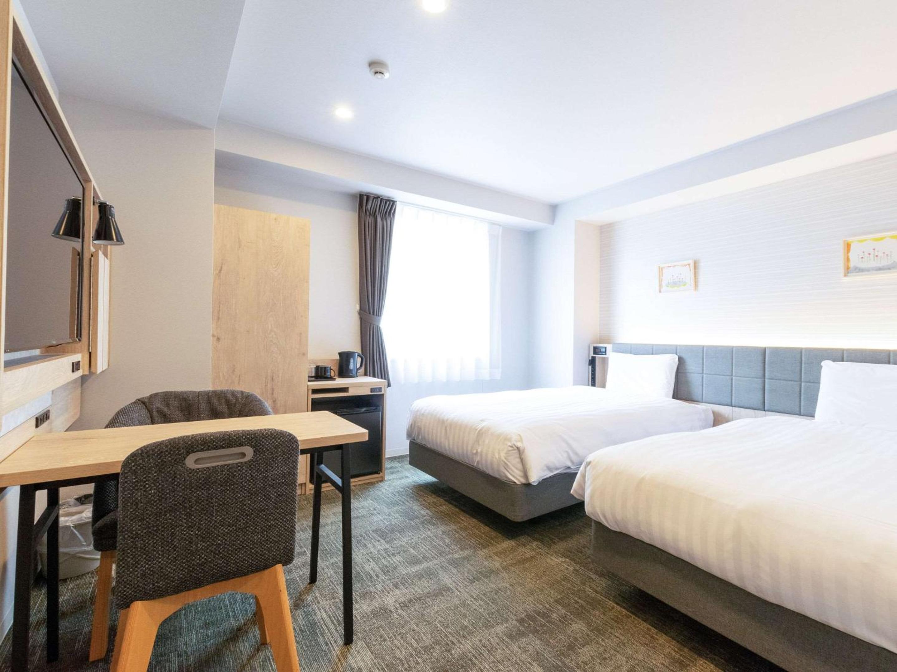 Twin Room - Non-Smoking - Photo 1