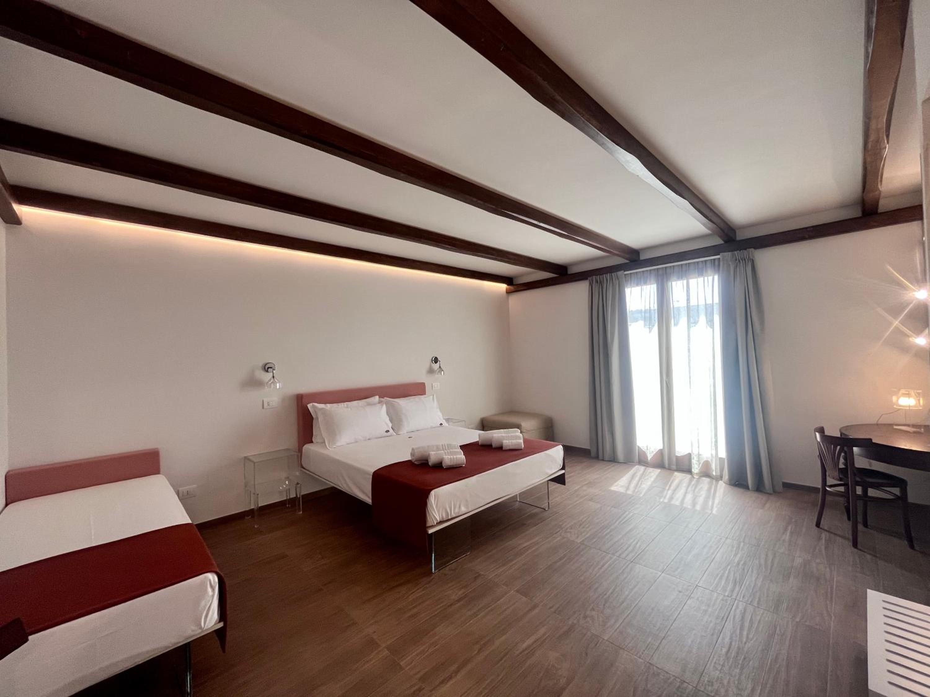 Quadruple Room with Balcony