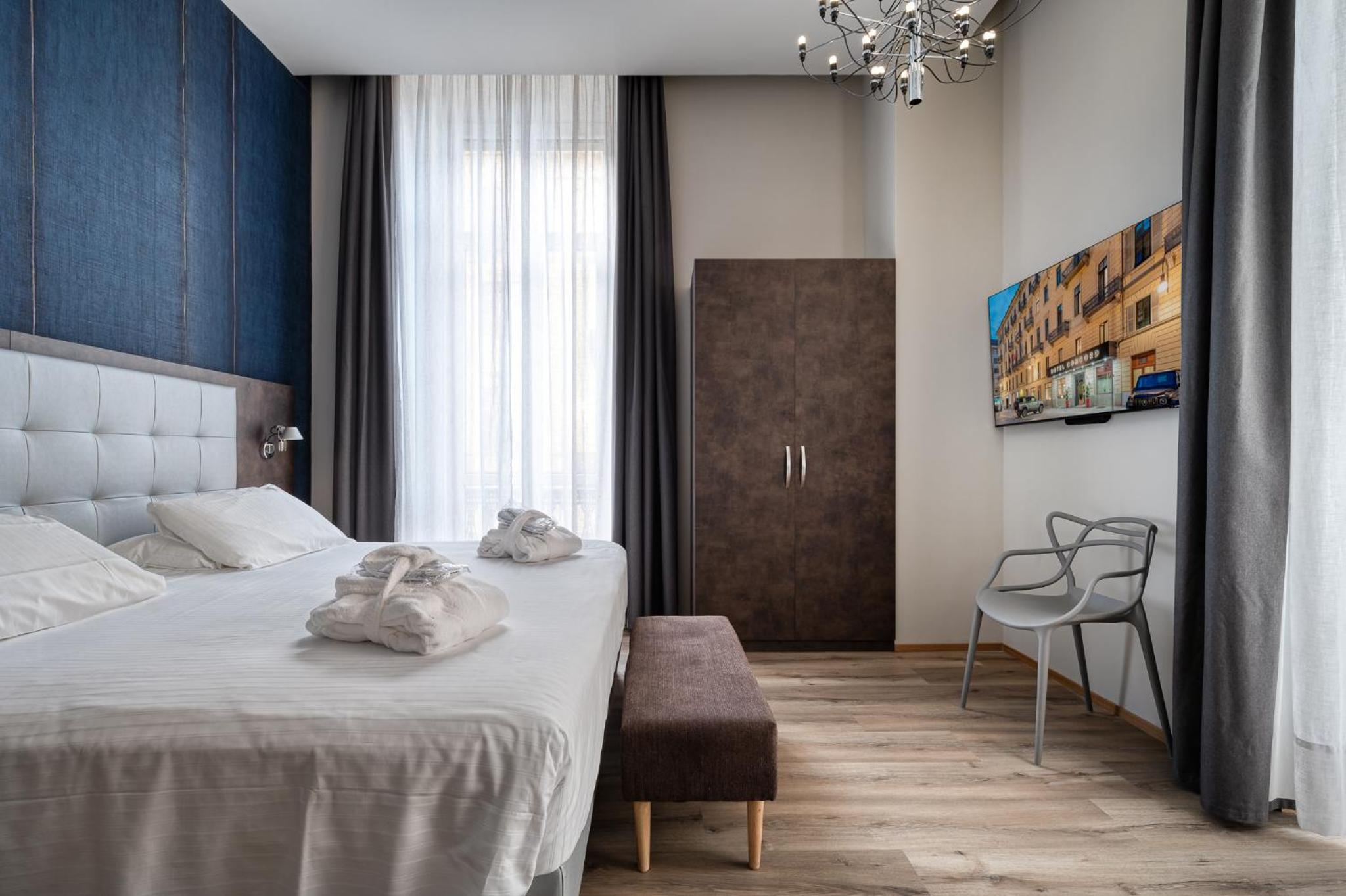 Deluxe Queen Room with Two Queen Beds - Photo 1