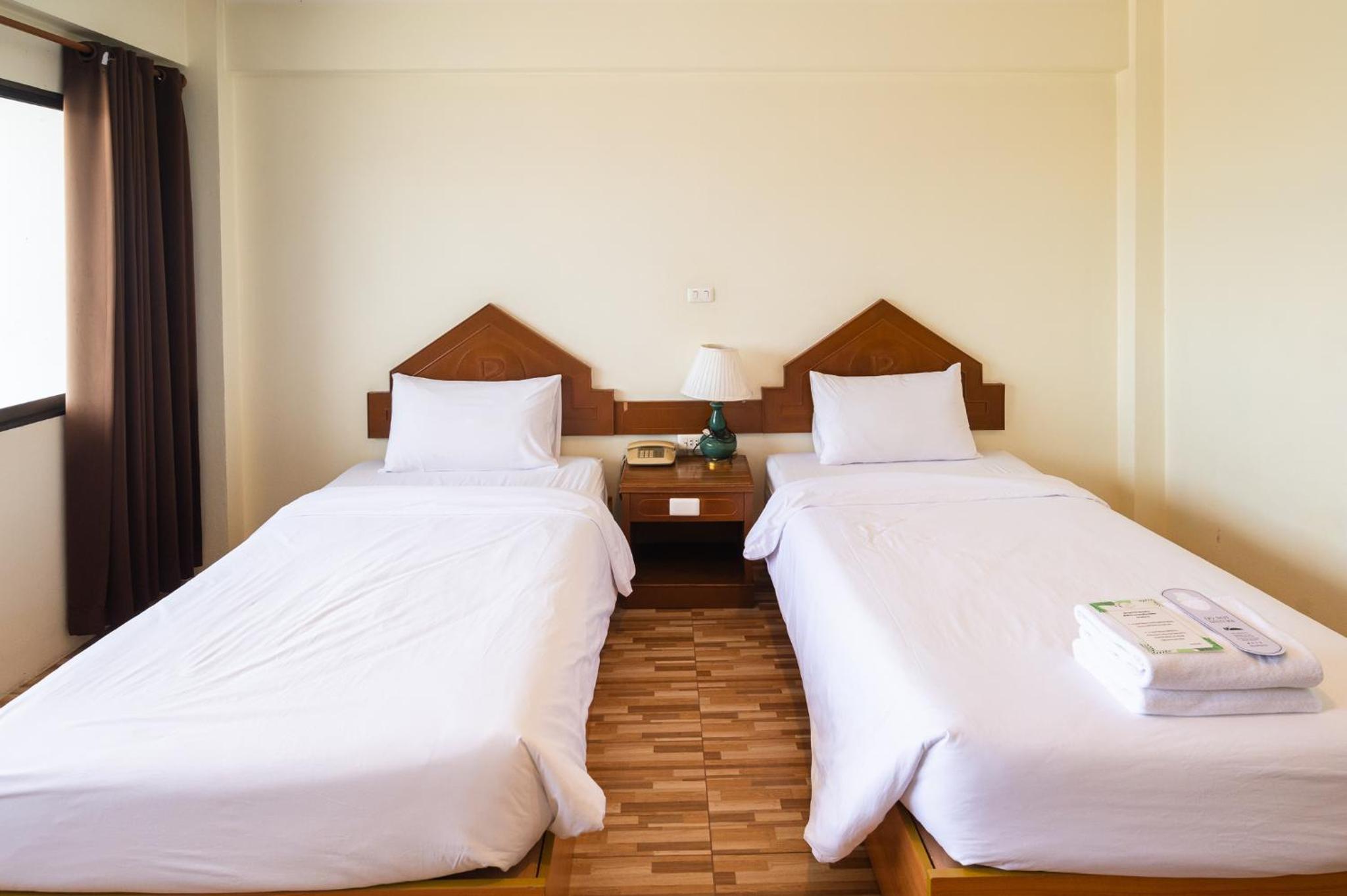 Standard Twin Room - Photo 4