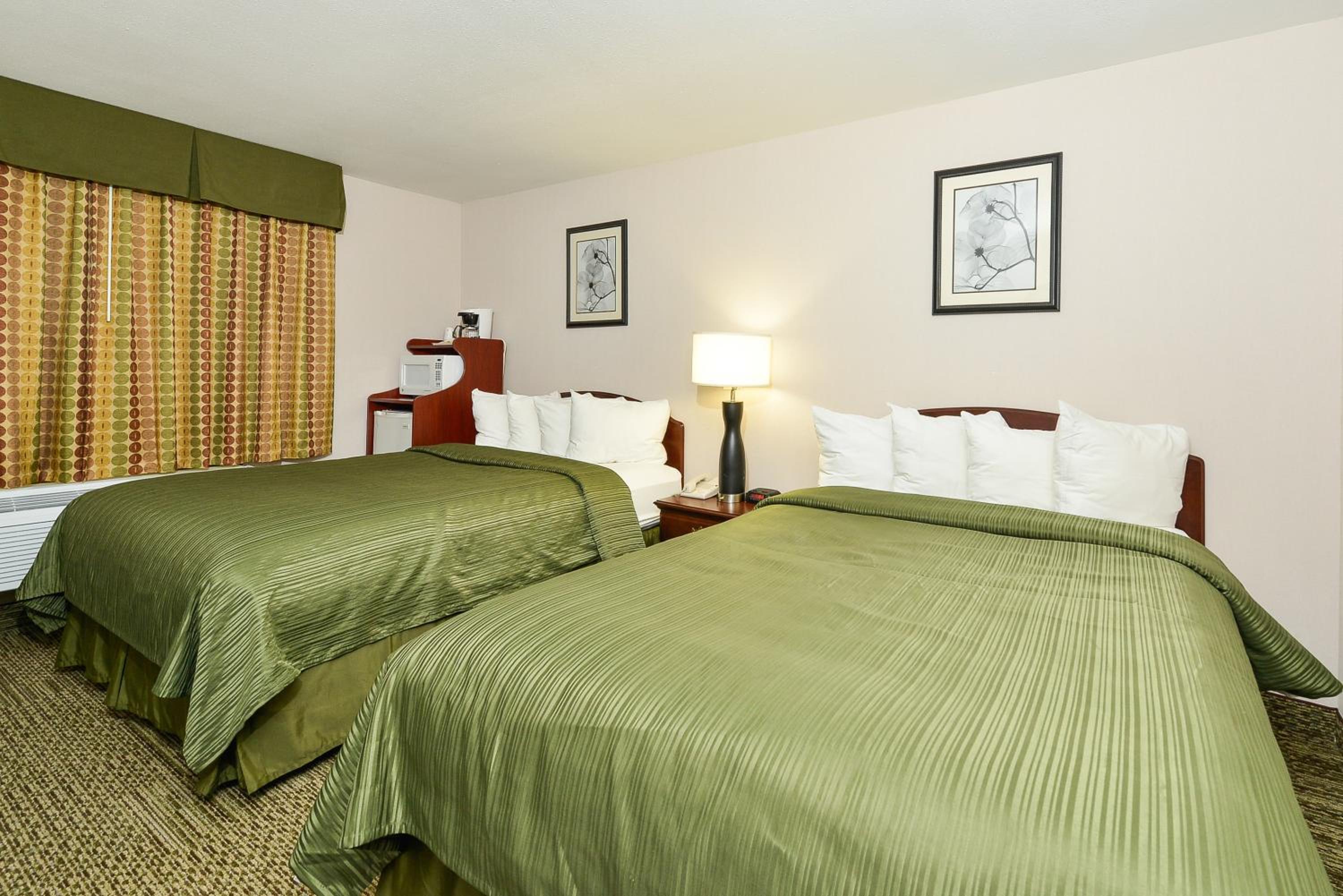 Queen Room with Two Queen Beds - Non-Smoking - Photo 1