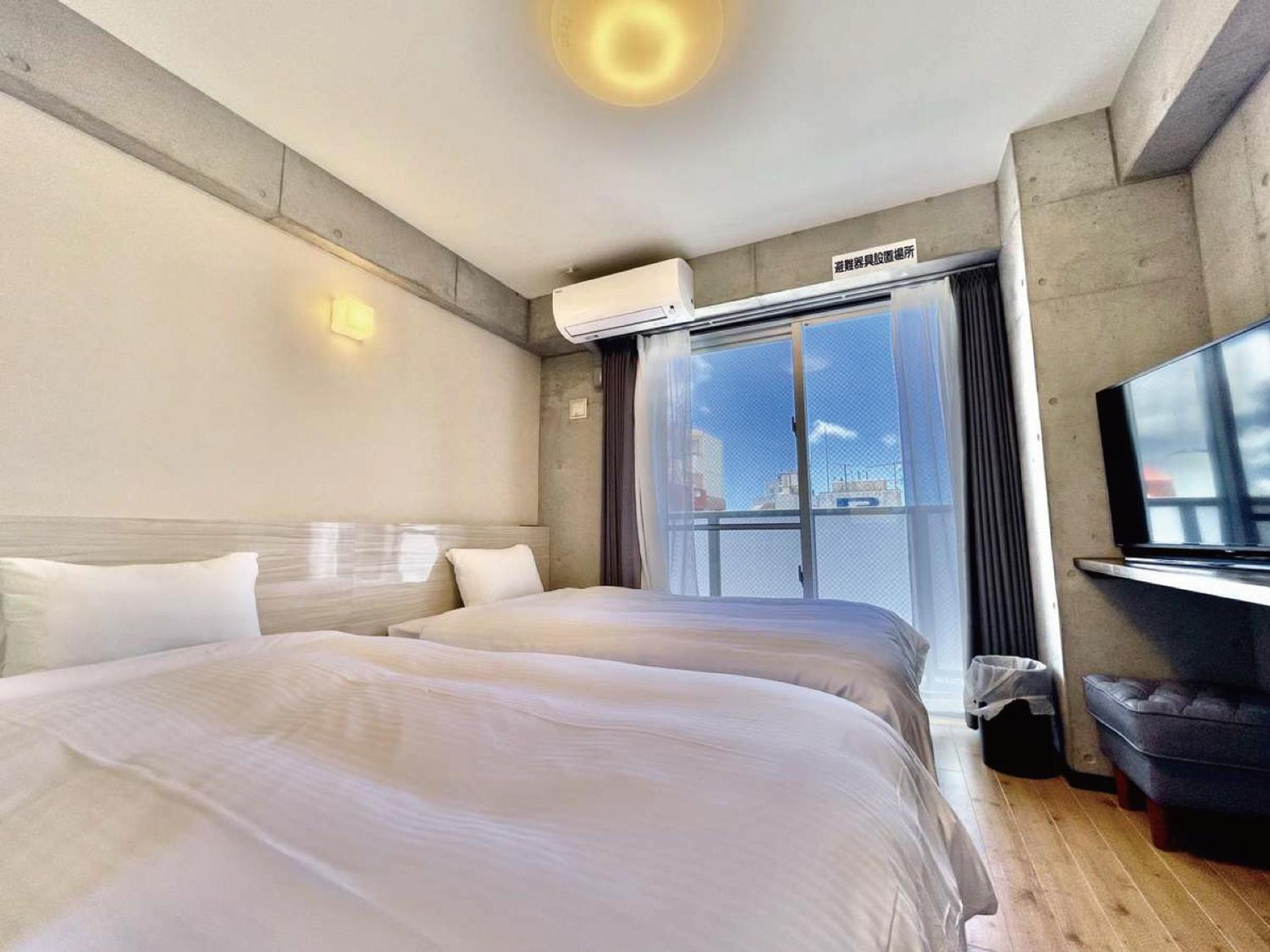 Standard Twin Room - Photo 1
