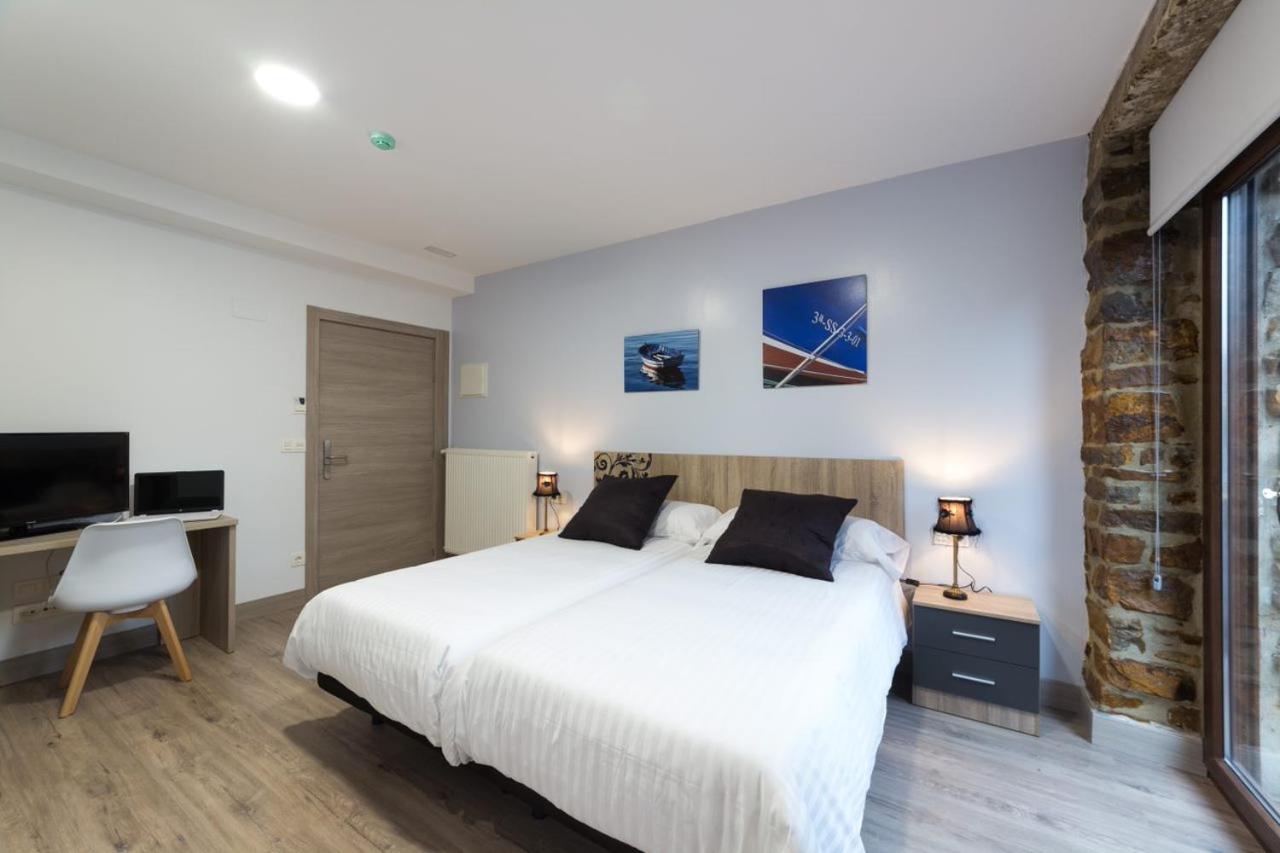 Habitación Triple con Balcón