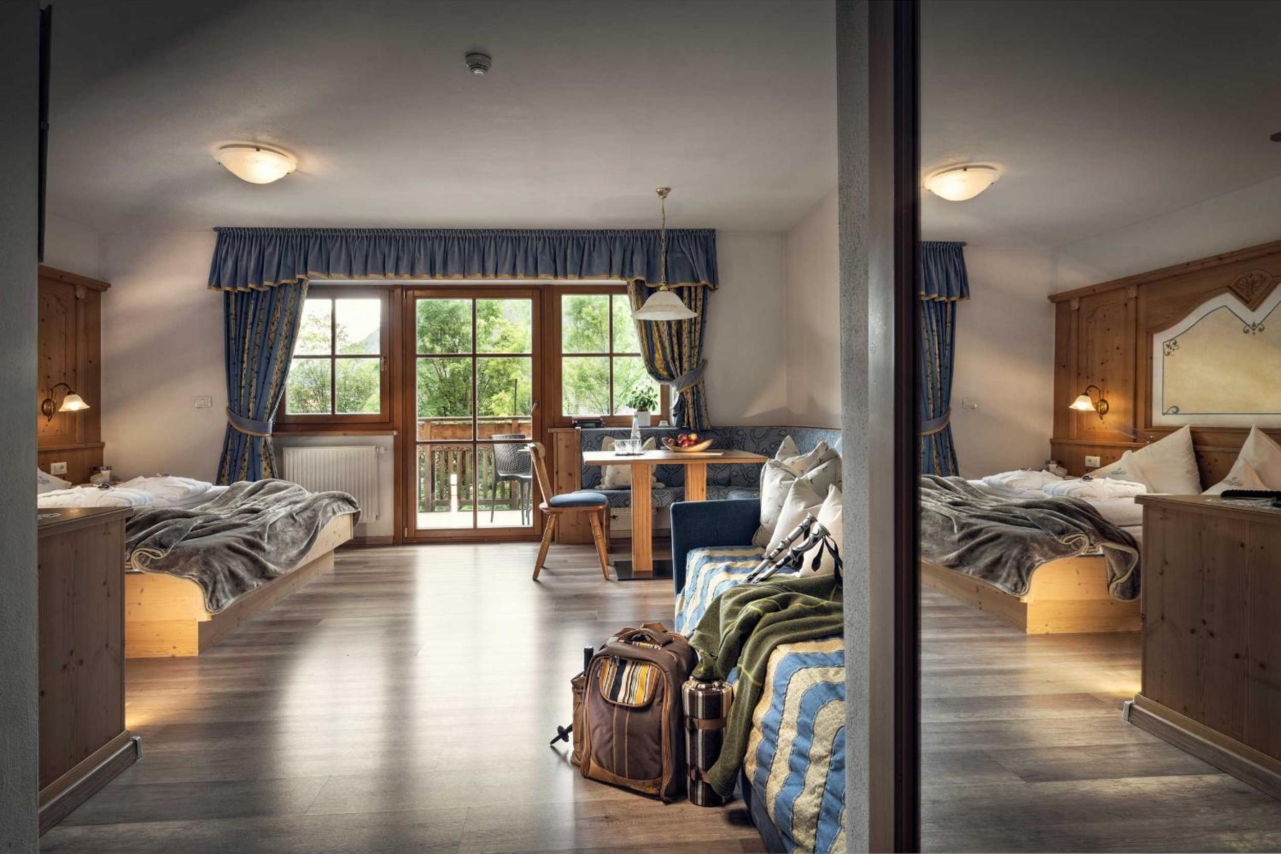 Deluxe Quadruple Room - Photo 2