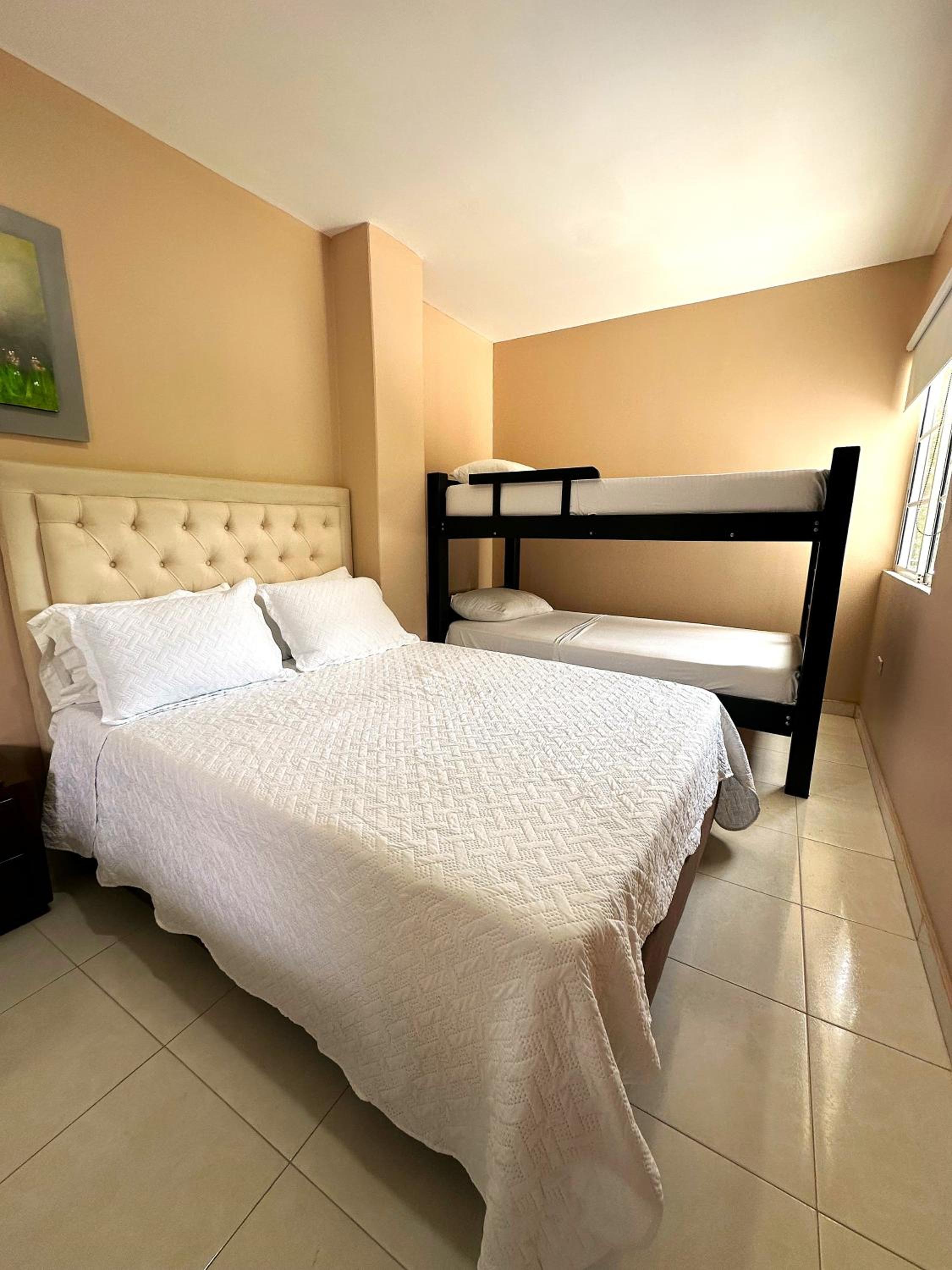 Standard Queen Room with Two Queen Beds photo 1