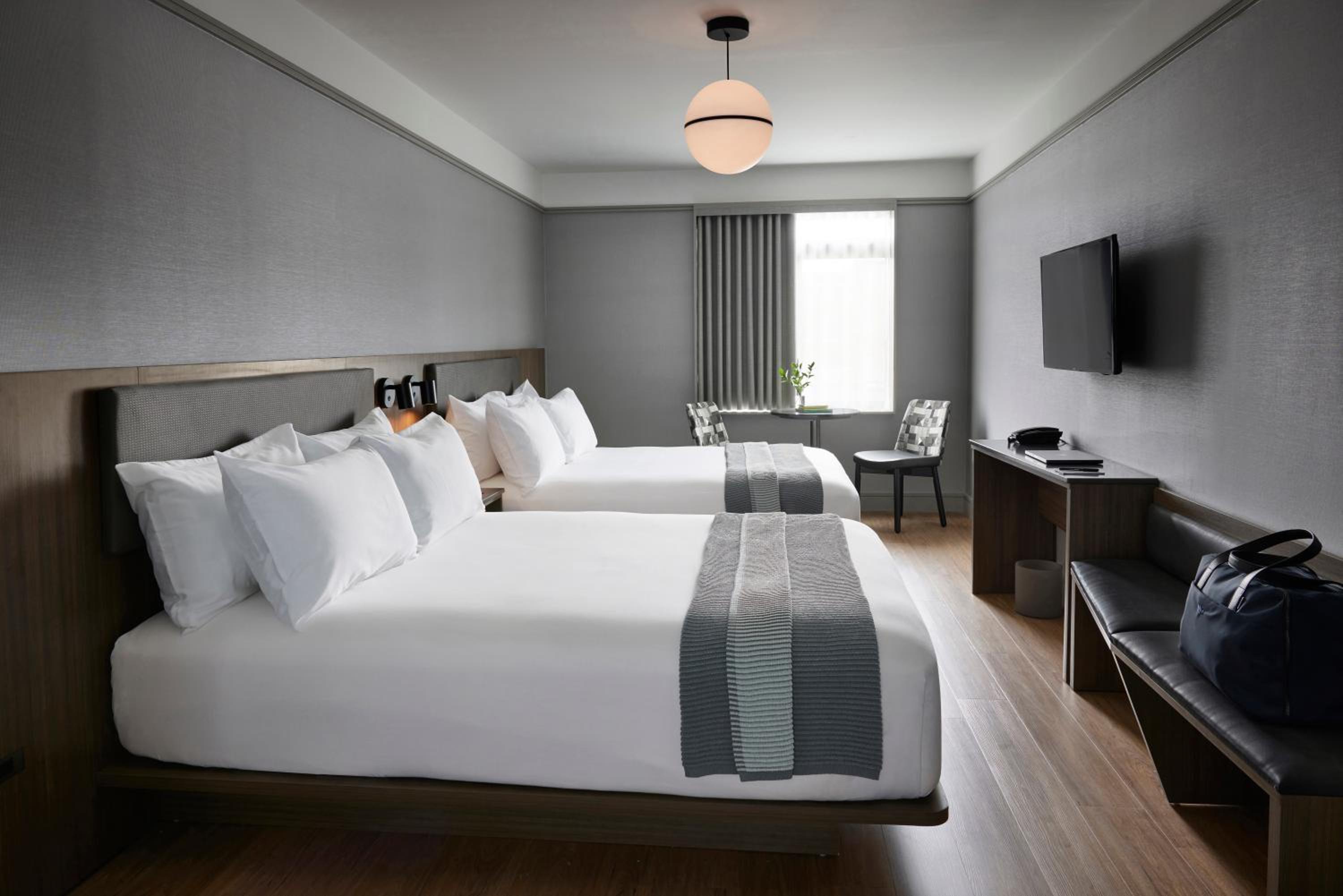 Superior Queen Room with Two Queen Beds - Photo 1