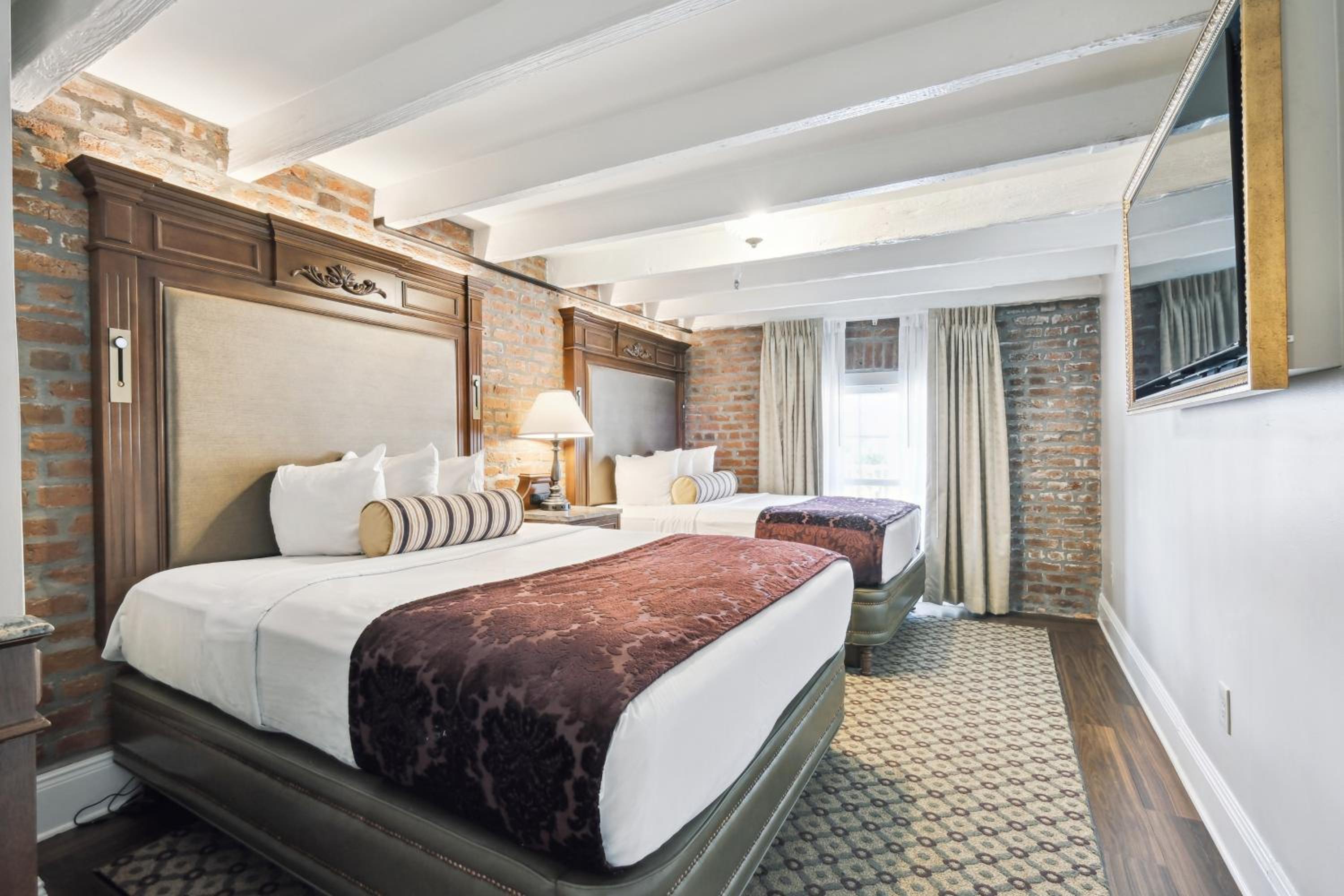 Deluxe Room with Two Queen Beds - Photo 1