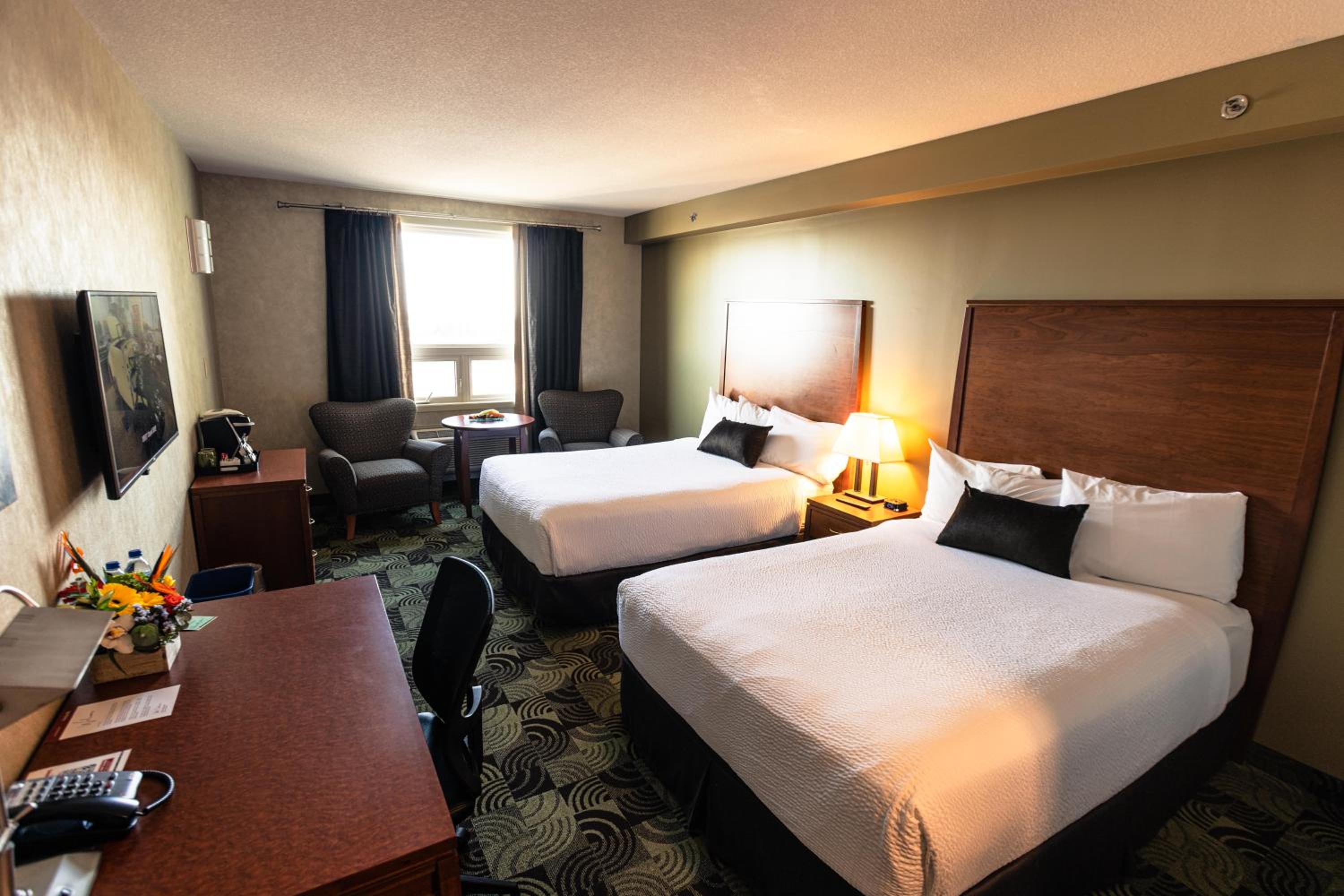 Standard Queen Room with Two Queen Beds - Photo 1