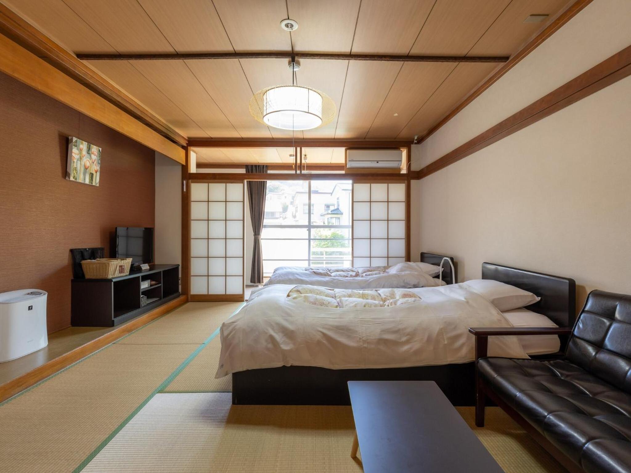Comfort Quadruple Room - Photo 10