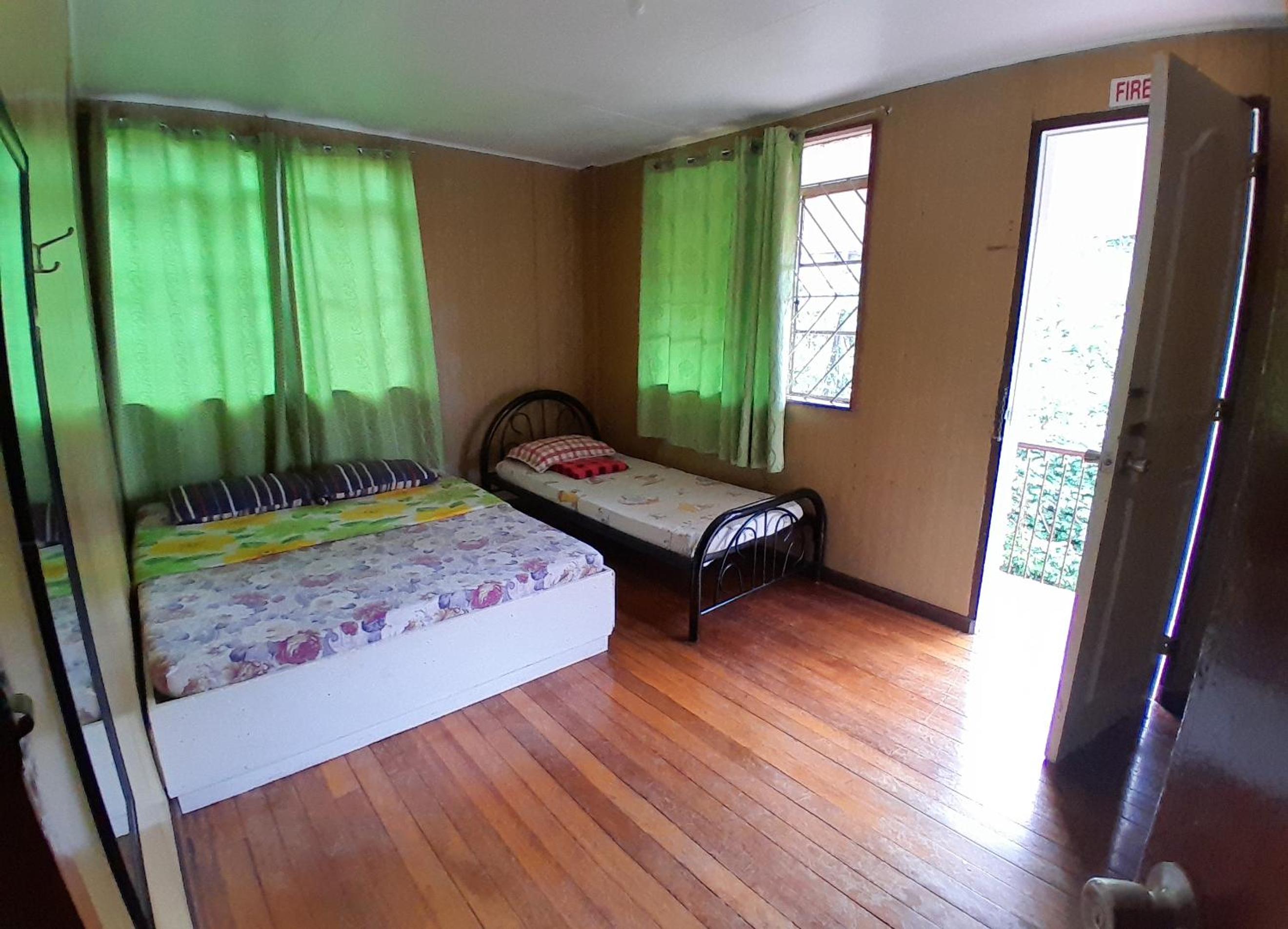 Three-Bedroom House - Photo 4