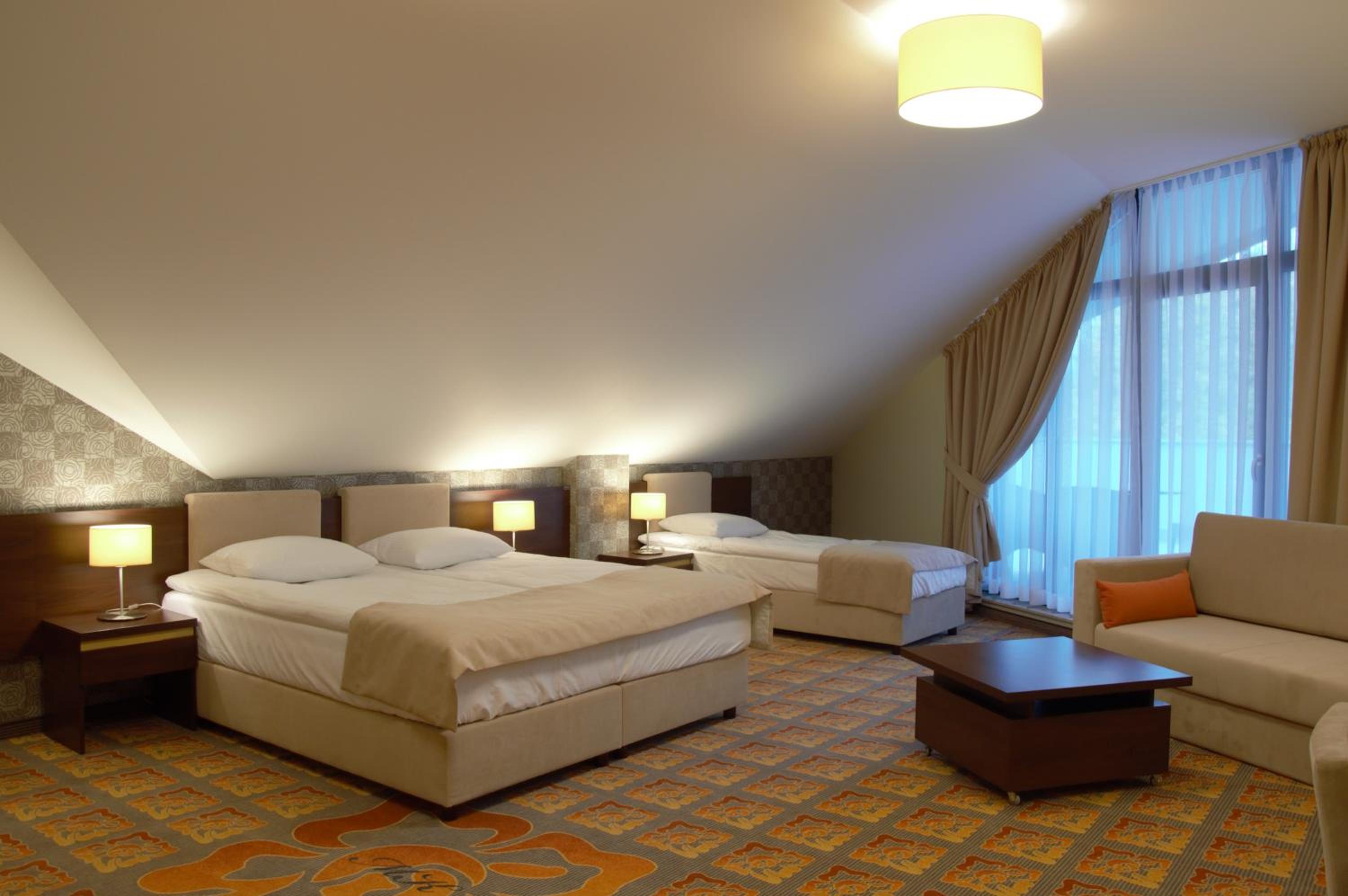 Quadruple Room with Private Bathroom - Photo 1