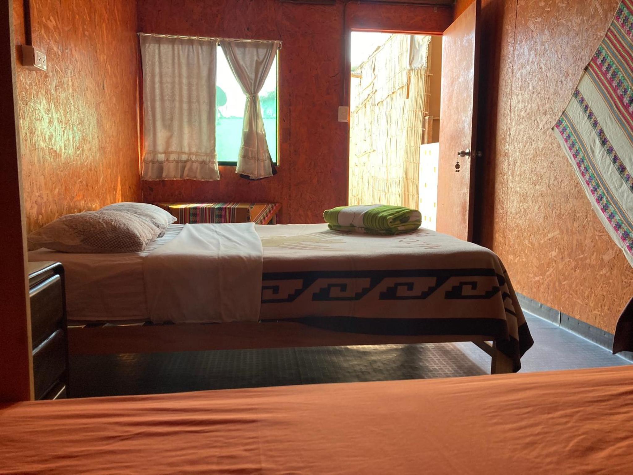 Economy Quadruple Room With Shared Bathroom photo 3