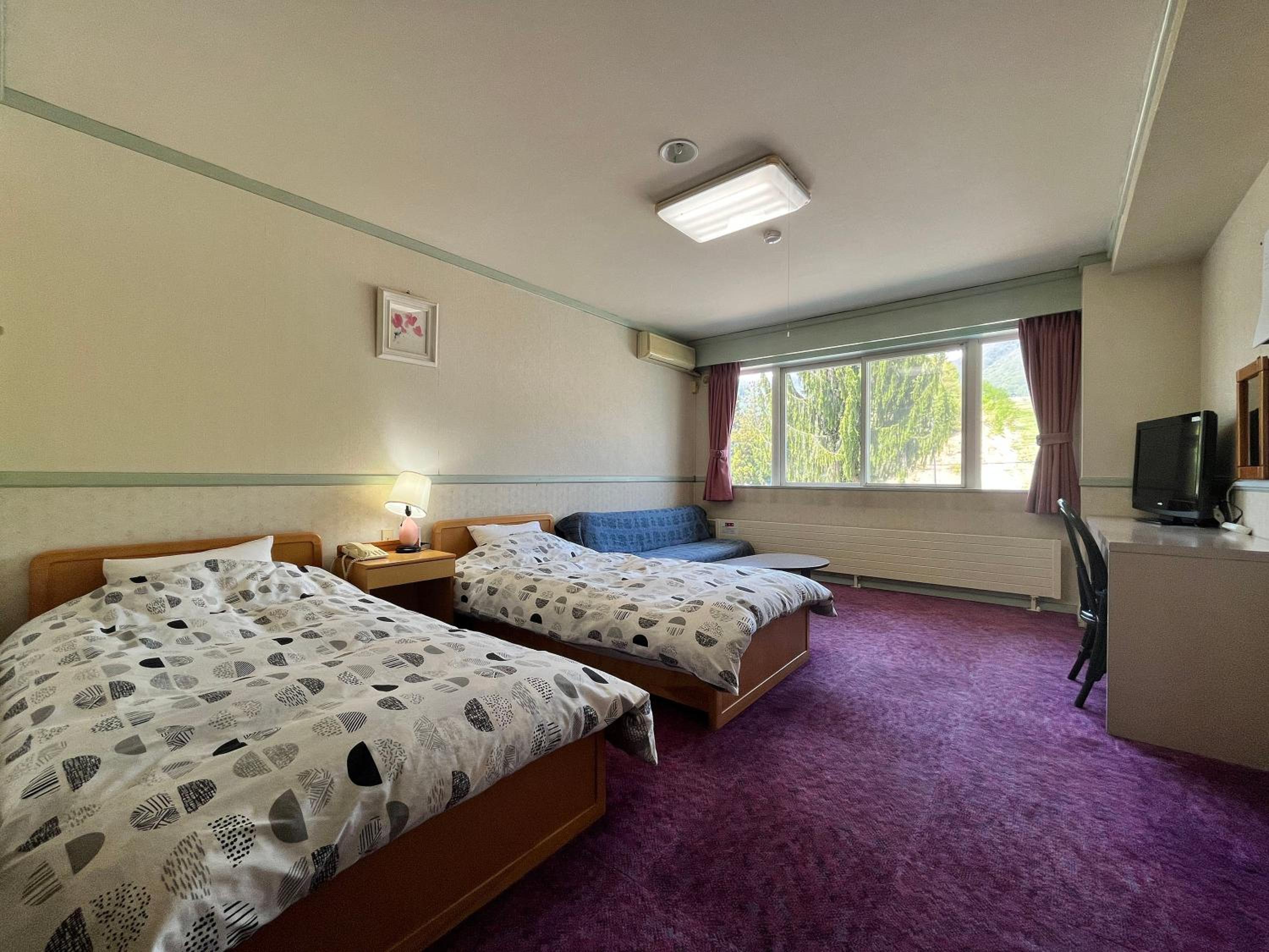 Twin Room - Photo 1